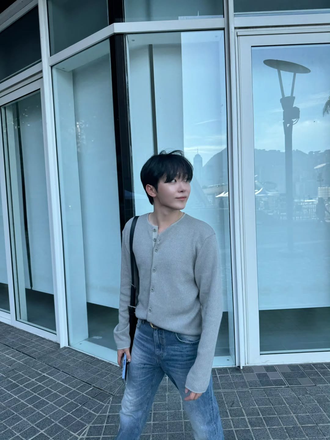 Photo by 승관 SEUNGKWAN on September 26, 2025. May be an image of one or more people, hair, turtleneck and text.