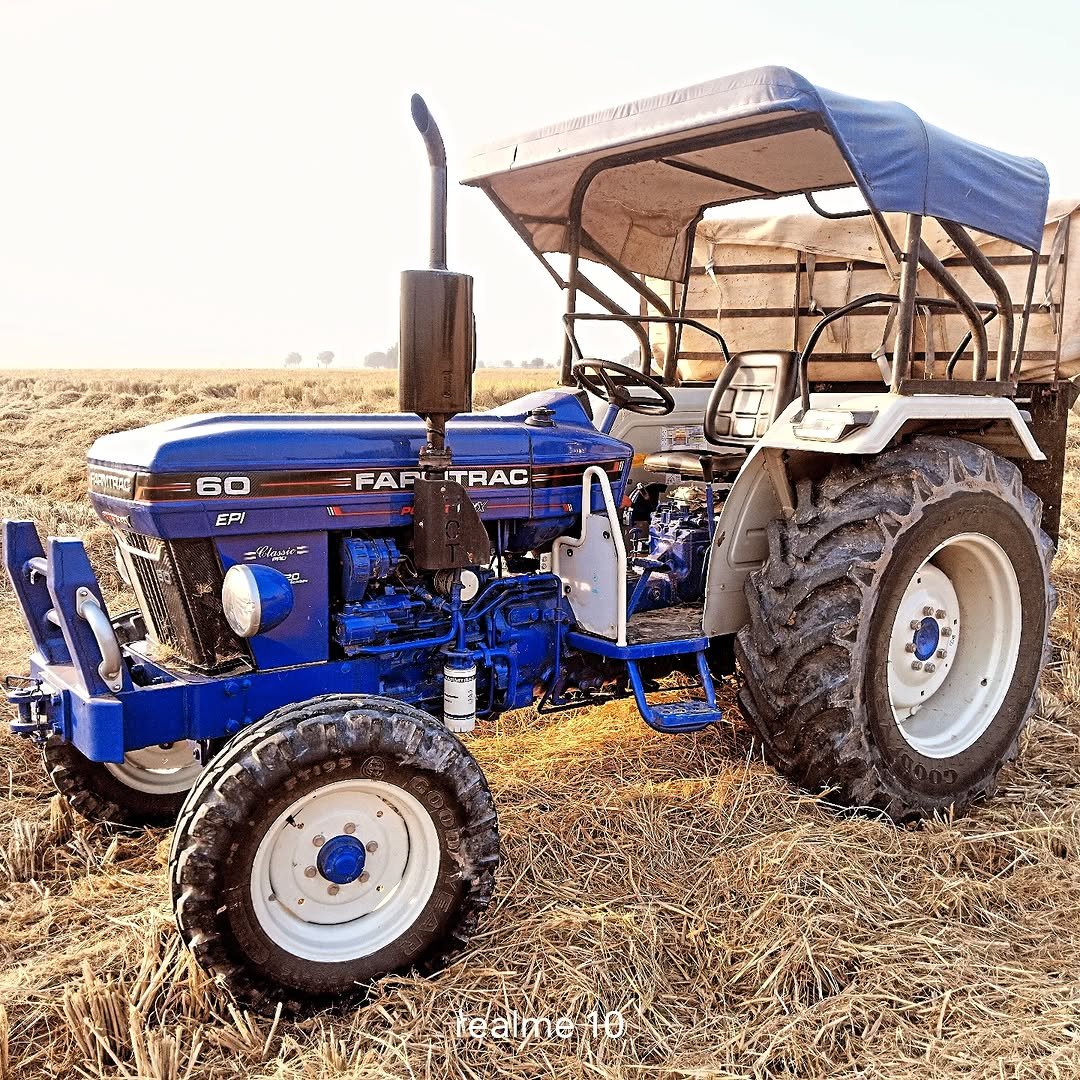 Photo by 🍁Rohit_saharan_pilibanga🍁 in India : इंडिया with @pooniakrishifarm. May be an image of combine, tractor and text.