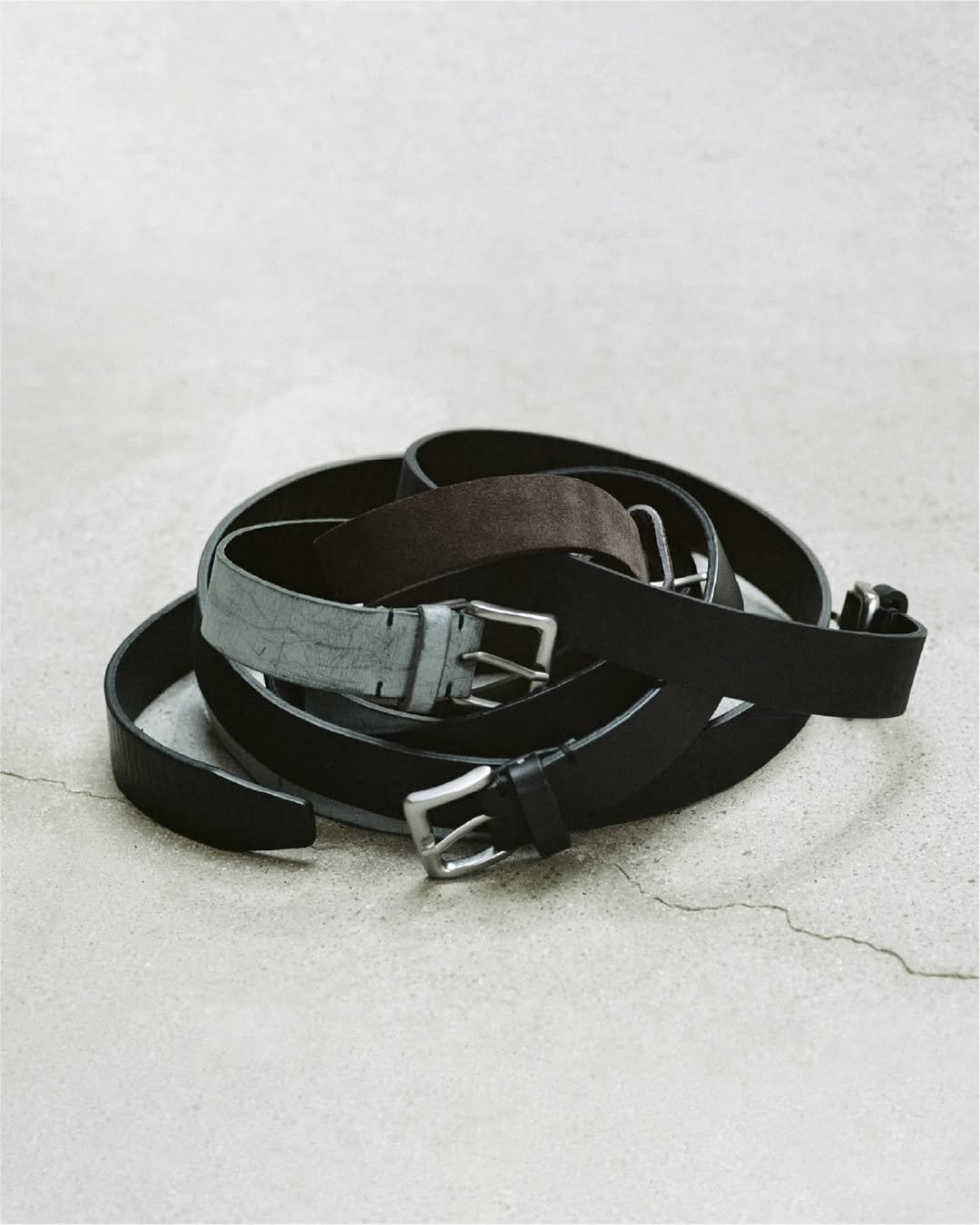 Photo by POST ARCHIVE FACTION (PAF) on November 30, 2025. May be an image of strap, belt, belt buckle and text.