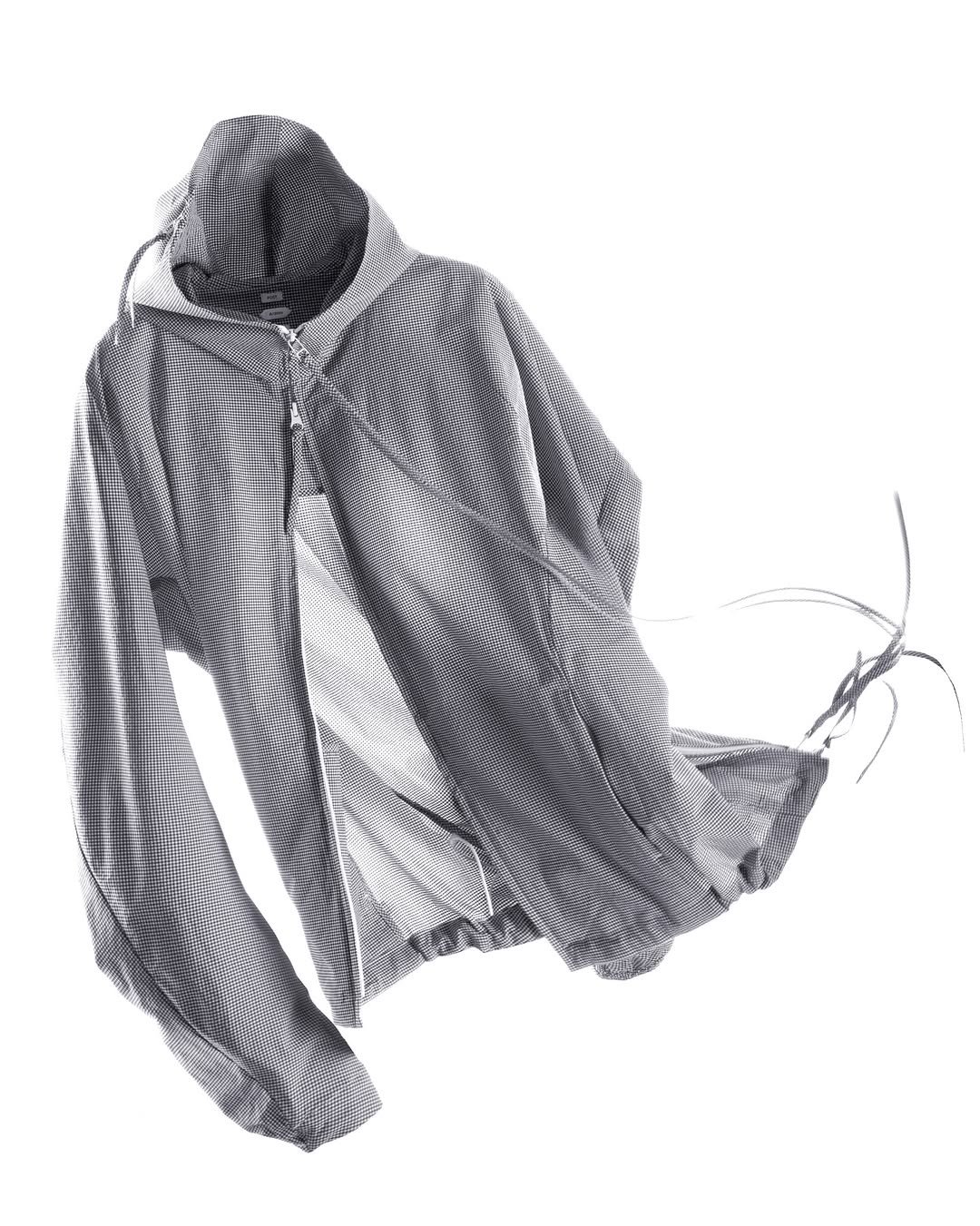 Photo by POST ARCHIVE FACTION (PAF) on February 19, 2026. May be an image of overcoat, cloak, shawl, parka and text.