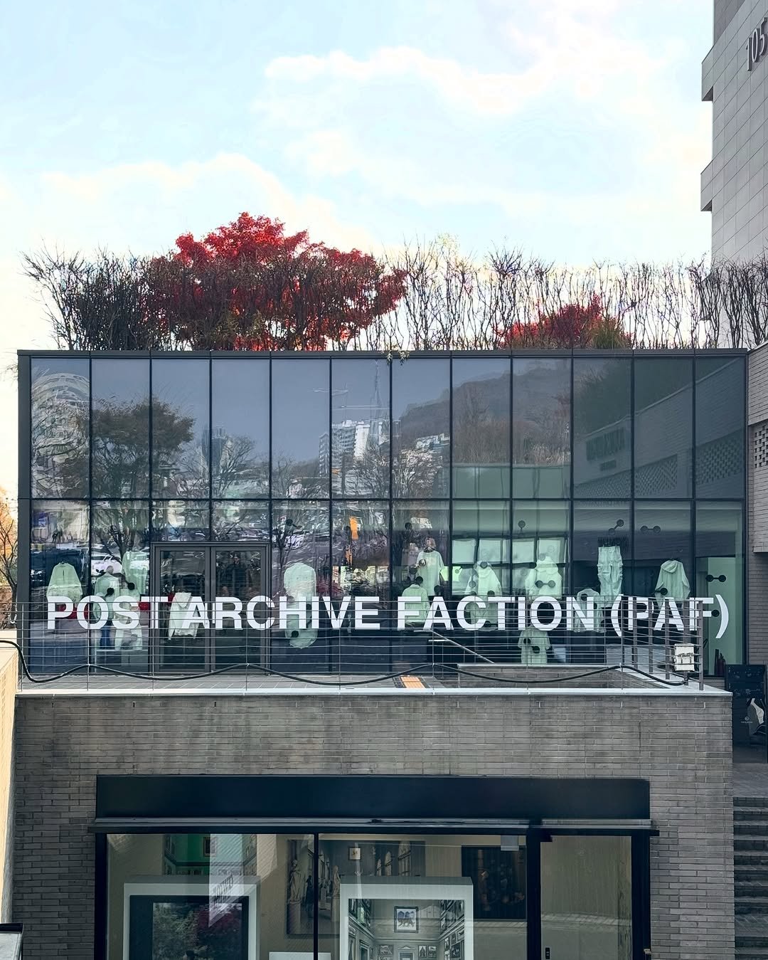Photo by POST ARCHIVE FACTION (PAF) on November 21, 2025. May be an image of display case, buildings, window and text that says '松 星用 POSTARCHIVE FACTION FACTION(PAF) (PAF)'.