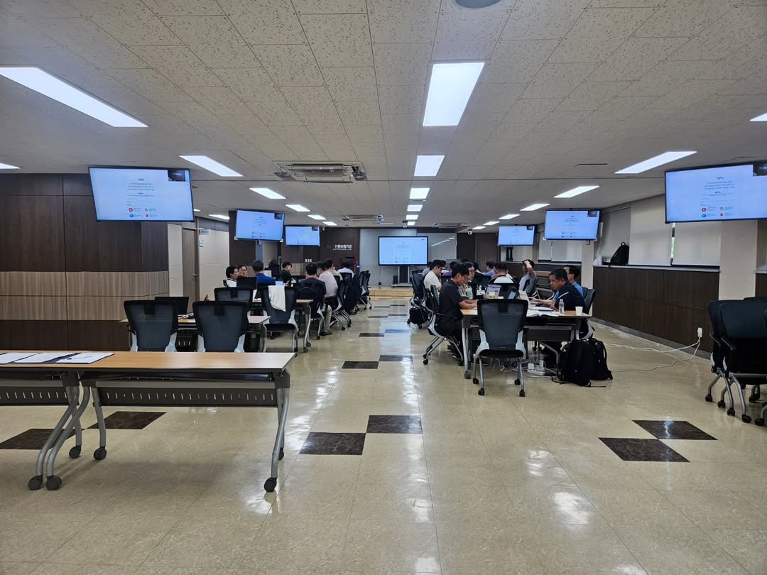 Photo by AI 겸임교수 이종범 on July 22, 2025. May be an image of 9 people, people studying, table, office and text.
