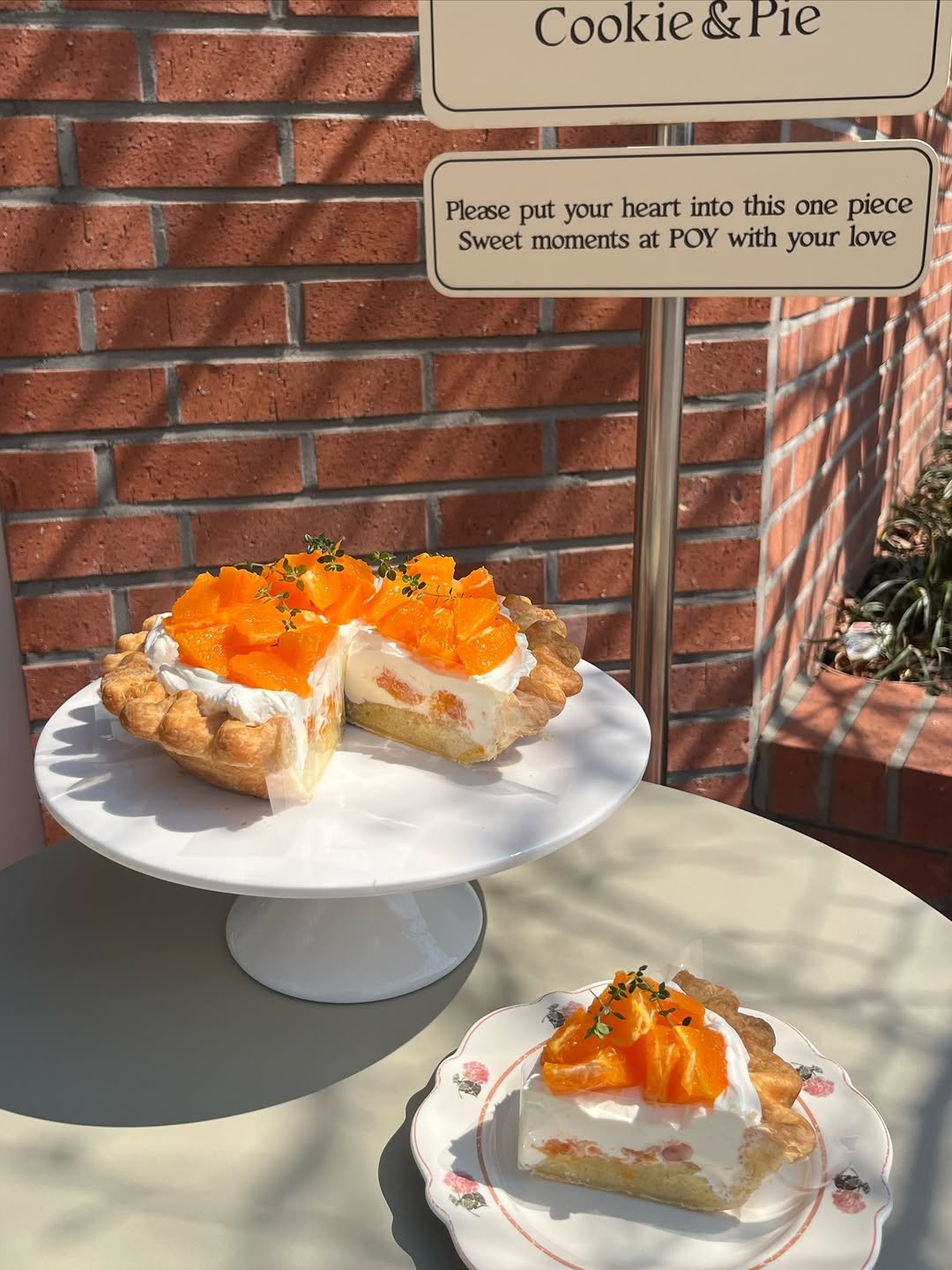 Photo by 동탄카페 POYPIE_포이파이 | 동탄디저트 동탄쿠키 동탄케이크 in 동탄신도시 with @poy_pie_shop. May be an image of chiffon cake, pie and text that says 'Cookie & Cookie&Ple Pie Please put your heart into this one piece Sweet moments at POY with your love 함볶의'.