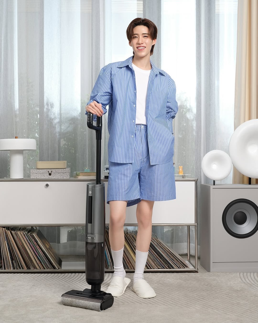 Photo shared by Krit Amnuaydechkorn on November 10, 2025 tagging @simplusappliance. May be an image of sleepwear, clothes iron, robe, bath robe, vacuum and text.