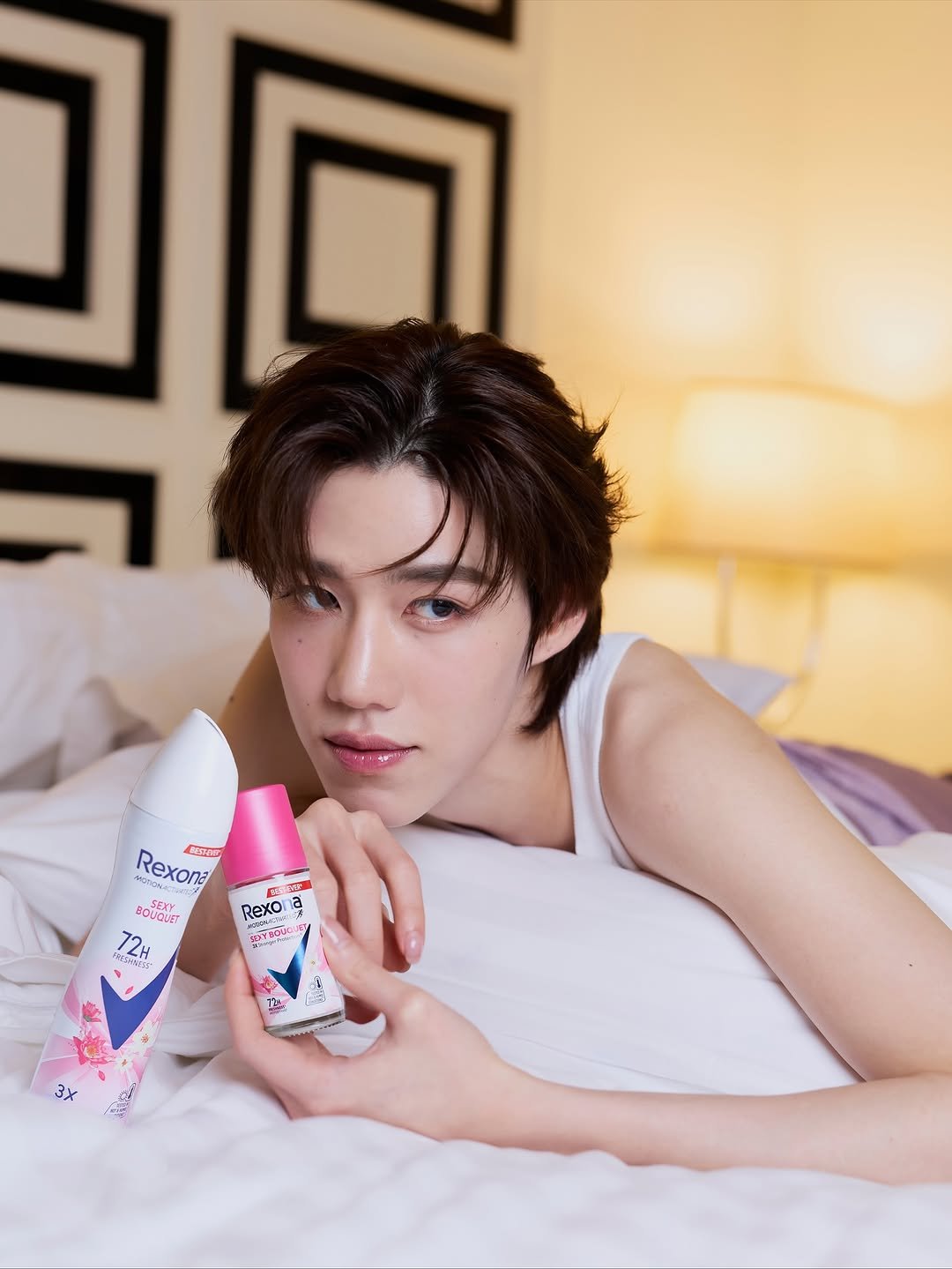 Photo shared by Krit Amnuaydechkorn on October 30, 2025 tagging @rexonathailand. May be an image of one or more people, makeup, hair brush, hand cream, bedroom and text.