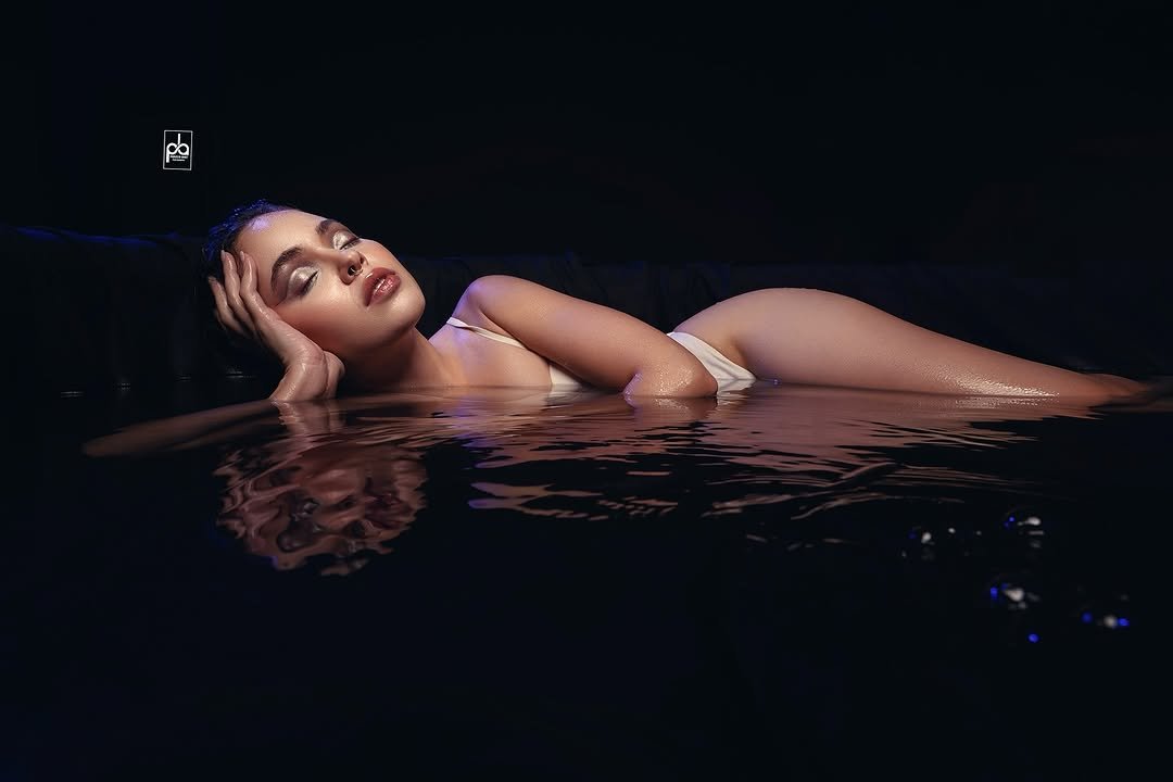 Photo by Praveen Bhat Photography on September 29, 2025. May be an image of 1 person, makeup, pool and text.