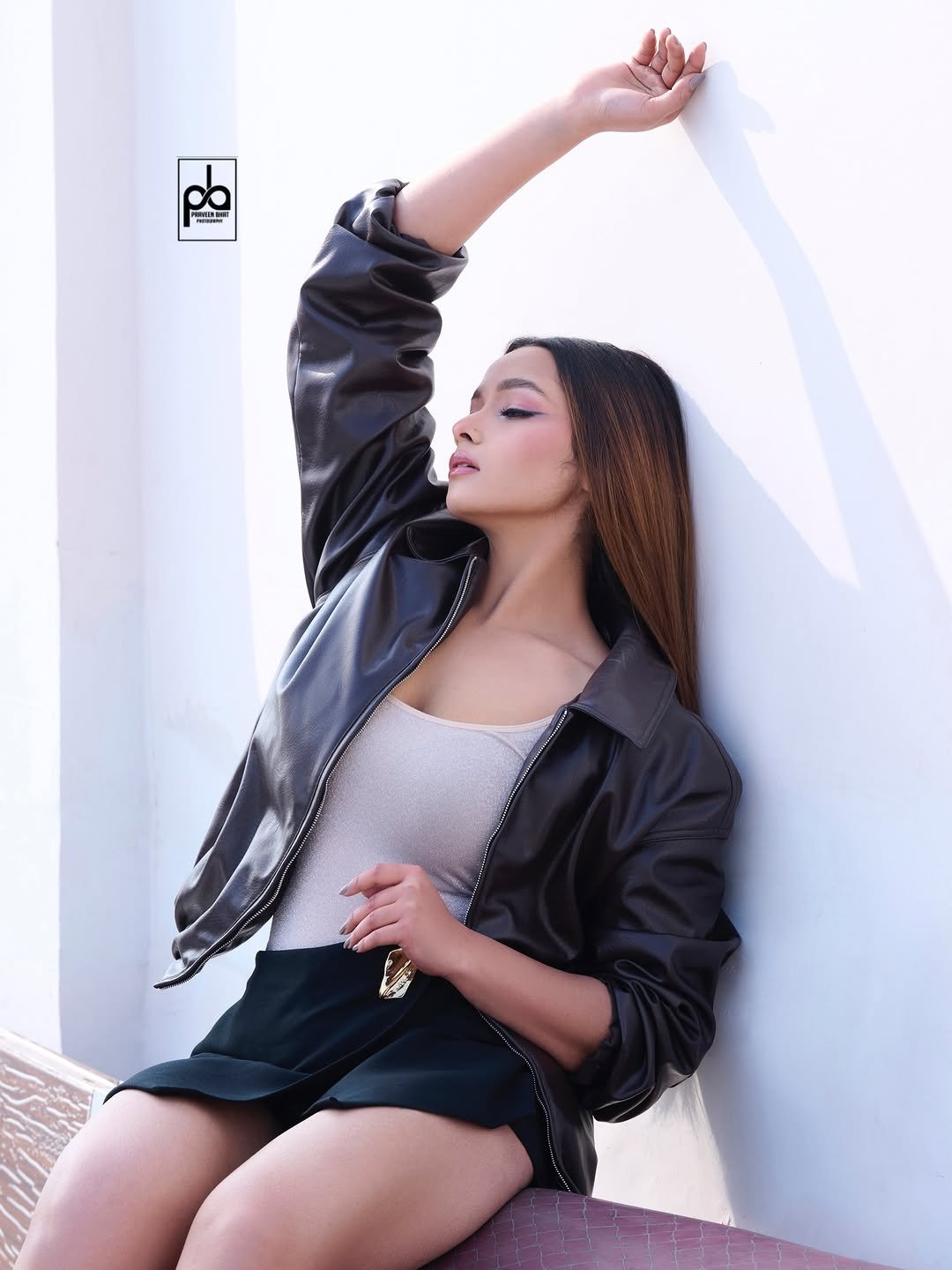 Photo shared by Praveen Bhat Photography on February 15, 2026 tagging @praveenbhatphotography. May be an image of one or more people, makeup, flight jacket, outdoors and text.