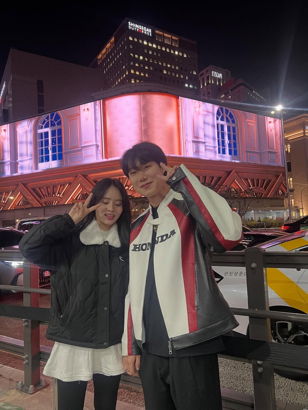 Photo shared by 박재훈 on November 18, 2025 tagging @qkrwogns99. May be an image of one or more people, duffle coat, parka, night and text.