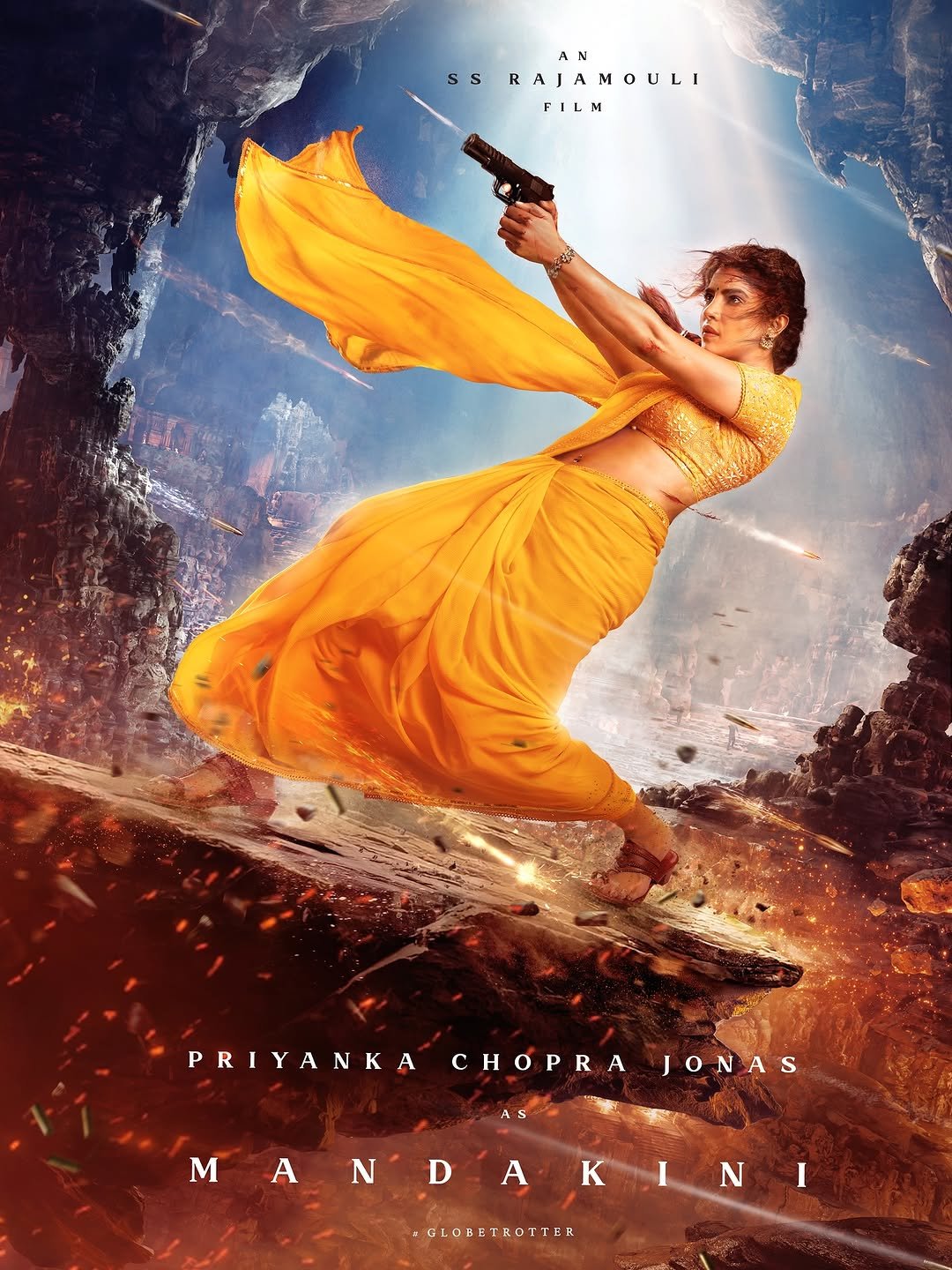 Photo by Priyanka on November 12, 2025. May be an illustration of costume, sword, poster and text that says 'Ss AN RAJAMOULI A I FILM PRIYANKACHÓPRAJONAS PRIYANKA CHOPRA JONAS AS M ANDAKINI D A N A κ I N I GLOBETROTTER'.