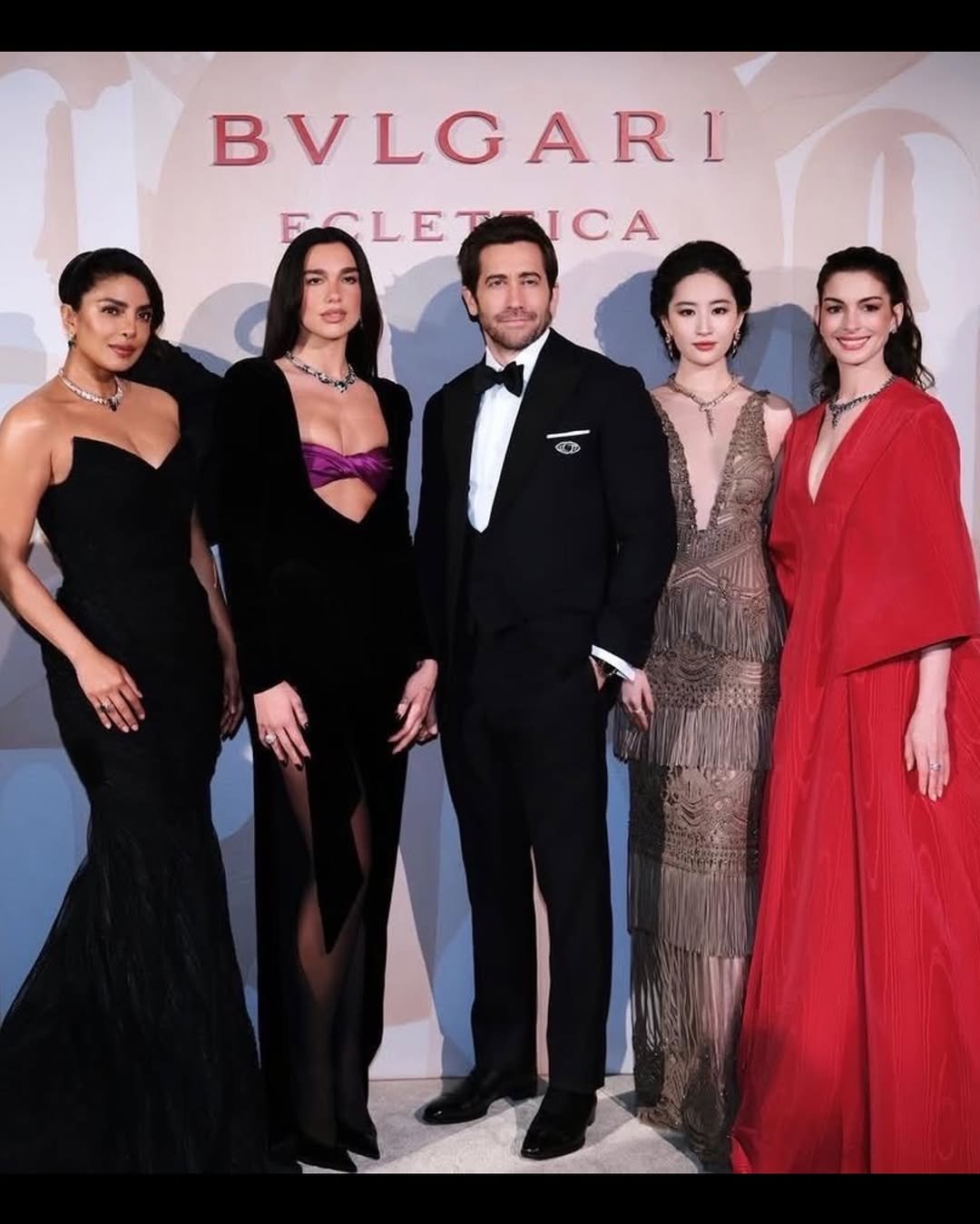 Photo shared by Priyanka on March 24, 2026 tagging @dualipa, @annehathaway, @jakegyllenhaal, and @yifei_cc. May be an image of one or more people, dinner jacket and text that says 'BVLGARI FSLETAICA ICA FCLET'.