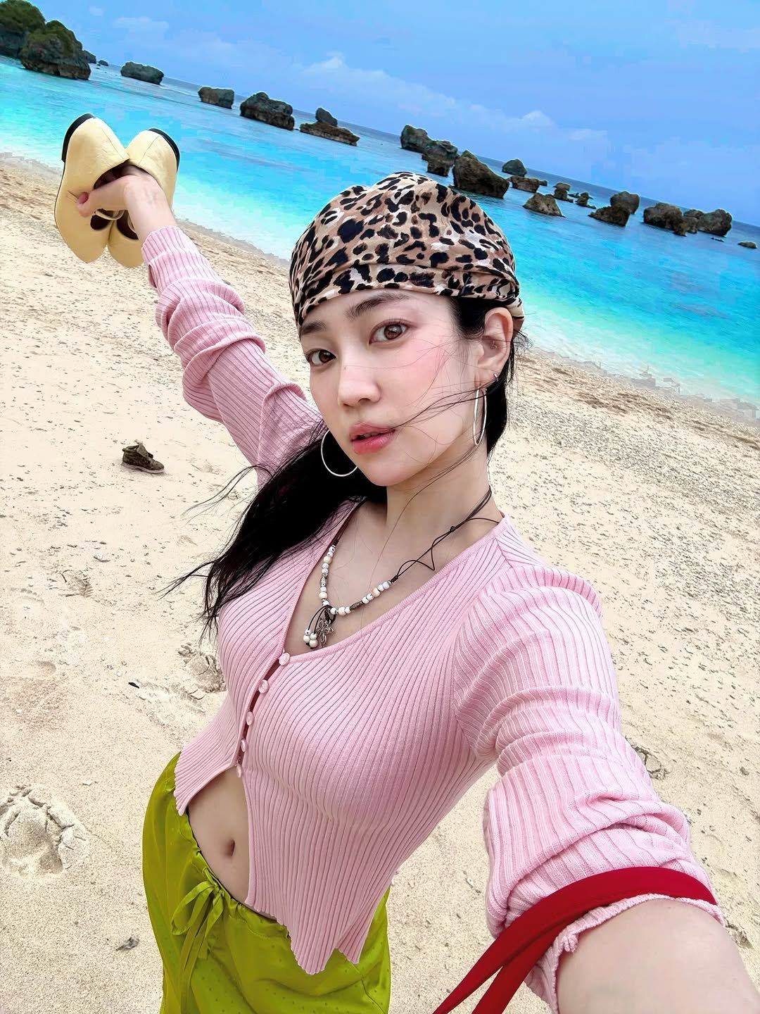 Photo by 황지현 on April 12, 2026. May be an image of sarong, ocean, beach and text.