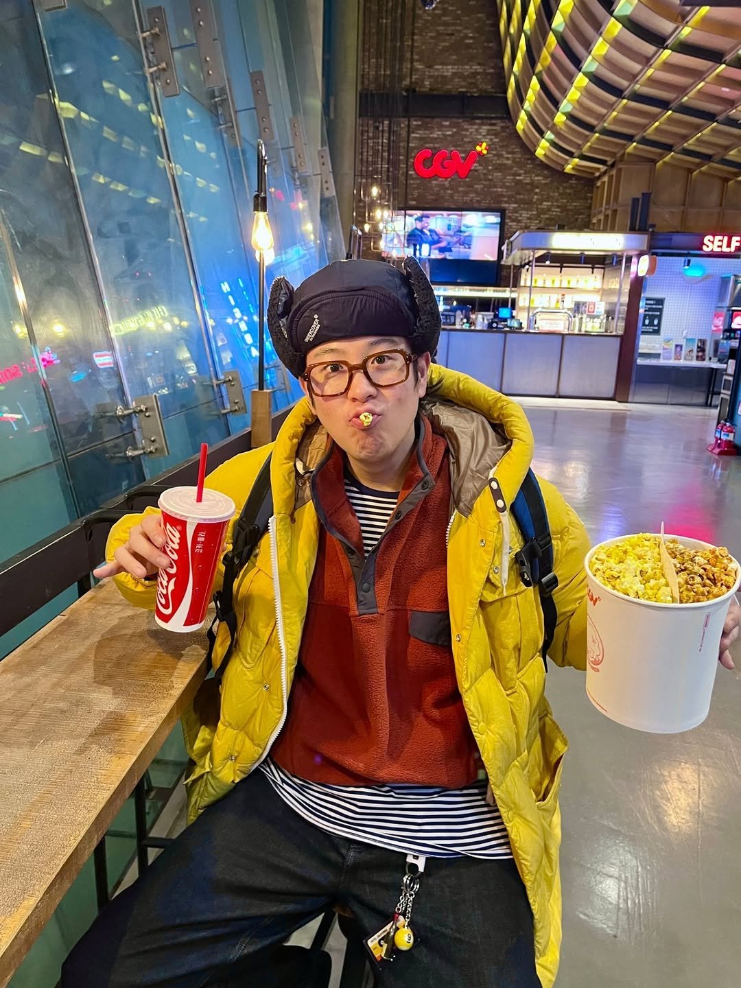 Photo by P.O on February 04, 2026. May be an image of duffle coat, popcorn, parka, bowler hat, glasses, eye patch, beret and text.