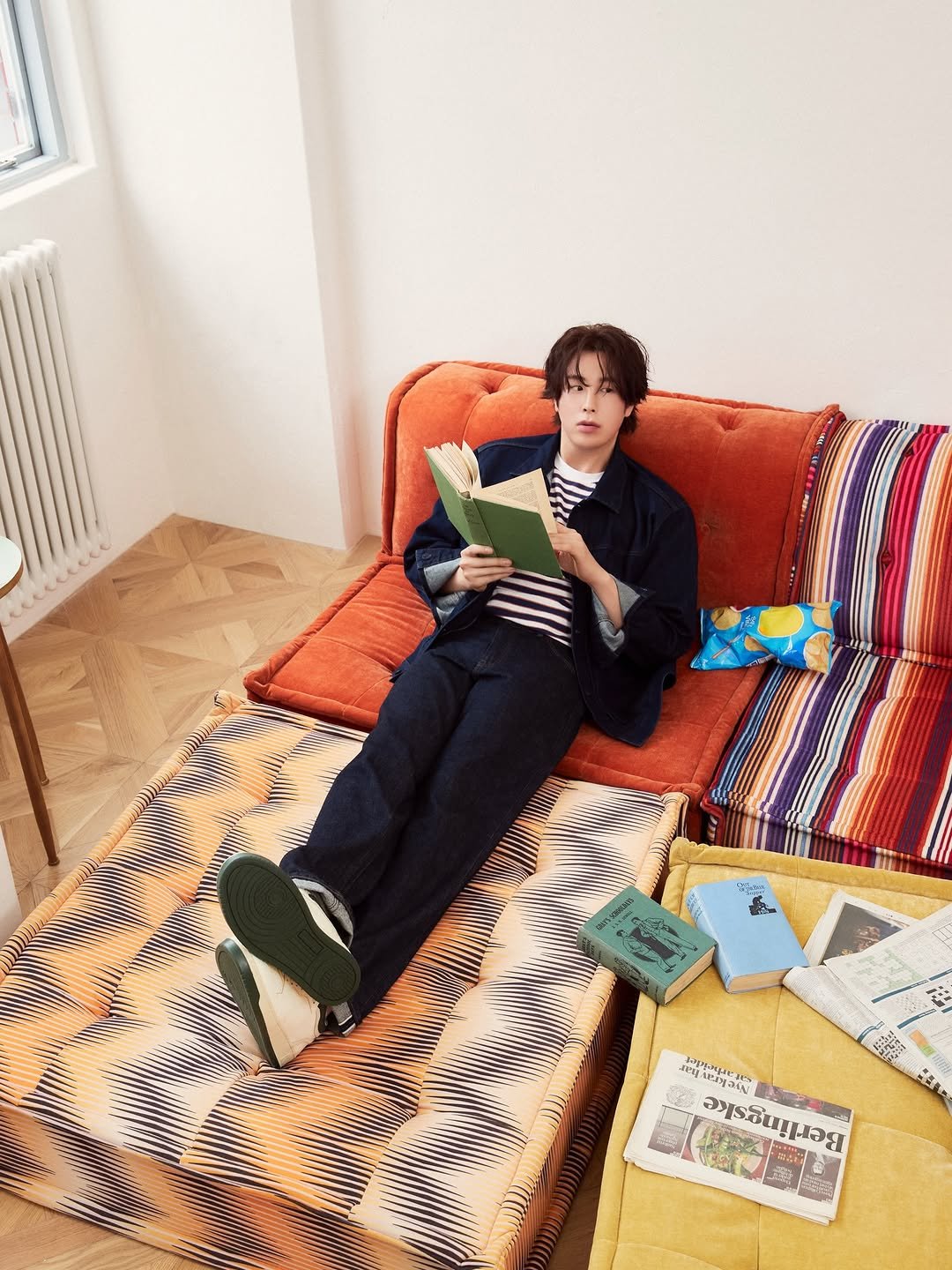 Photo shared by 유니클로 코리아 Uniqlo Korea on February 27, 2026 tagging @pyojihoon_official. May be an image of beanbag chair, chaise lounge, futon and text.