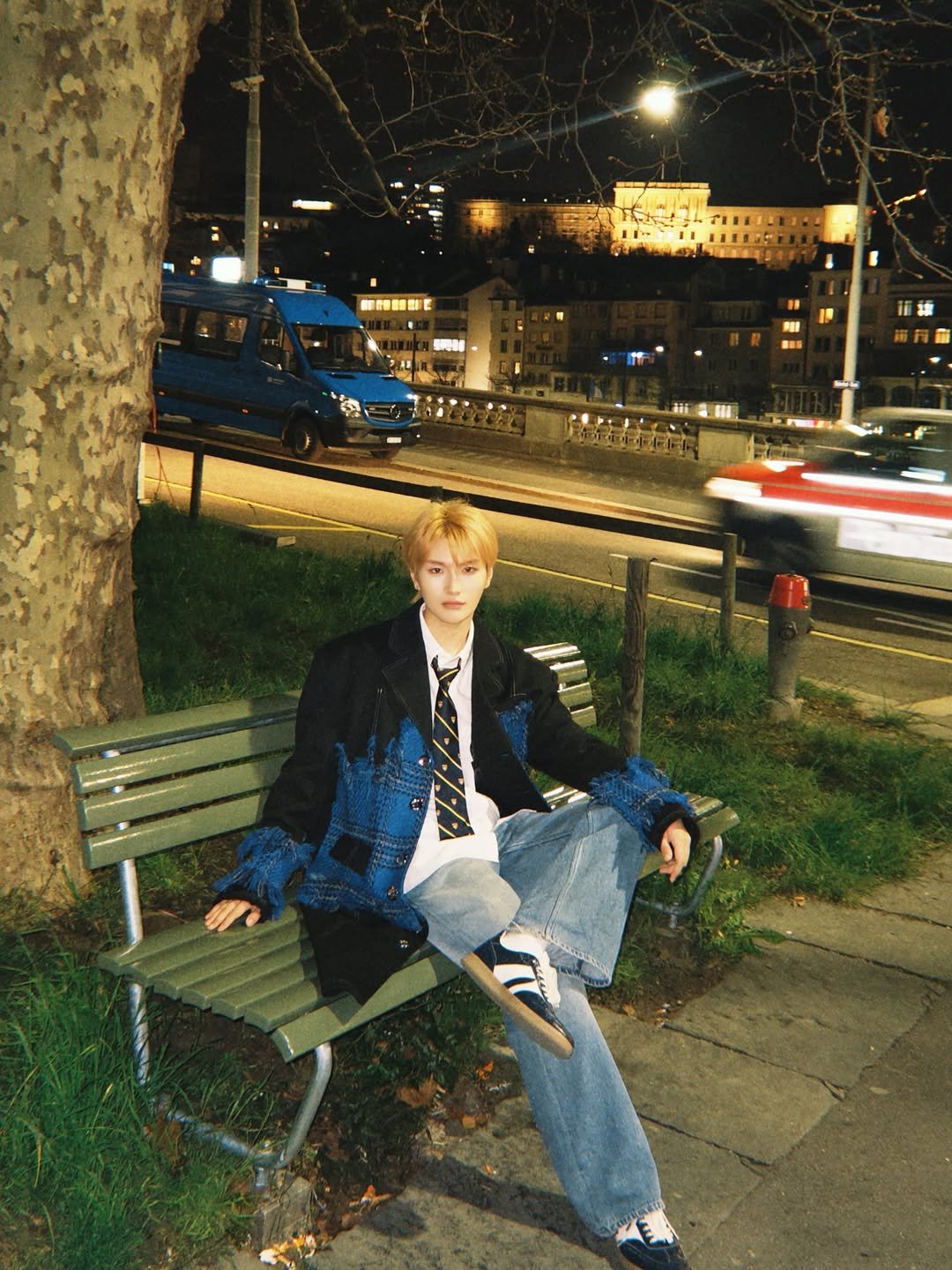 Photo by Chrisen Yang on March 24, 2026. May be an image of one or more people, makeup, duffle coat, magazine and text.