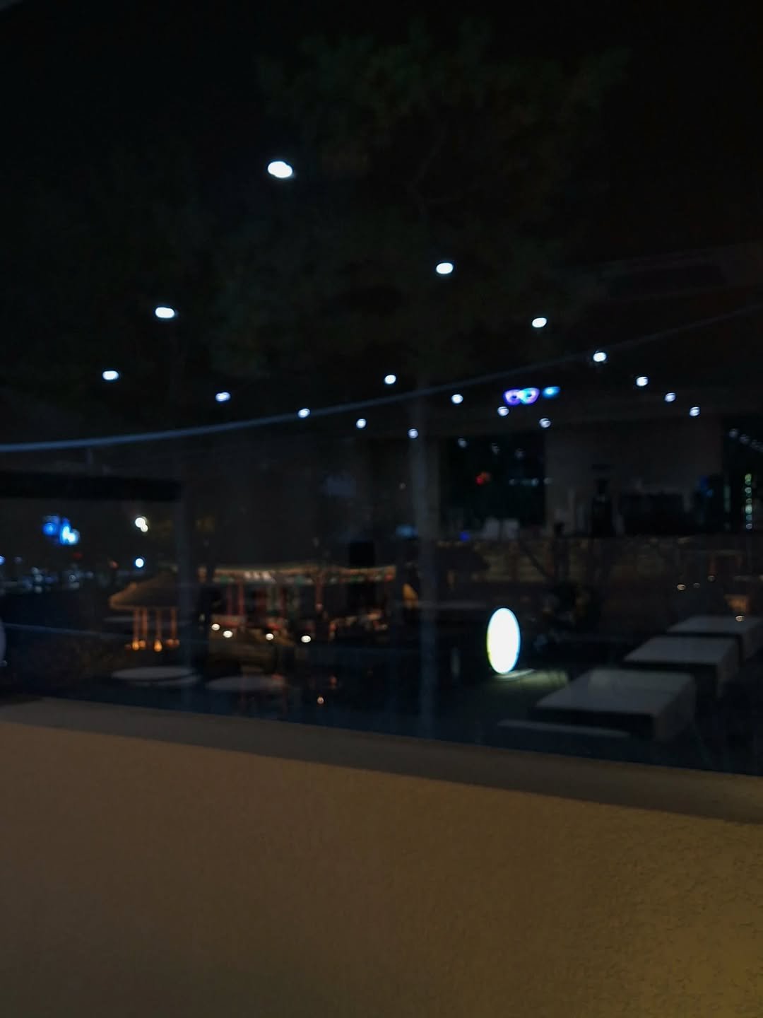 Photo by 서리달 on November 24, 2025. May be an image of lighting, night, window and text.