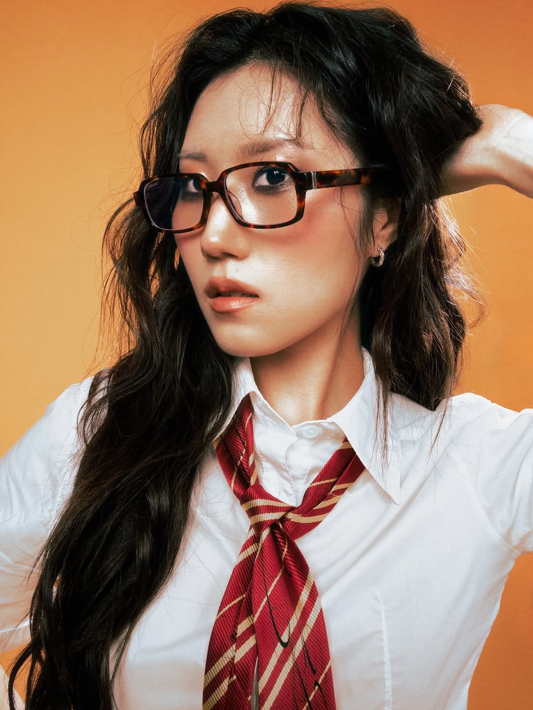 Photo shared by 소연 Soyeon on December 22, 2025 tagging @fayper_. May be an image of eyeglasses, bolo tie and text.