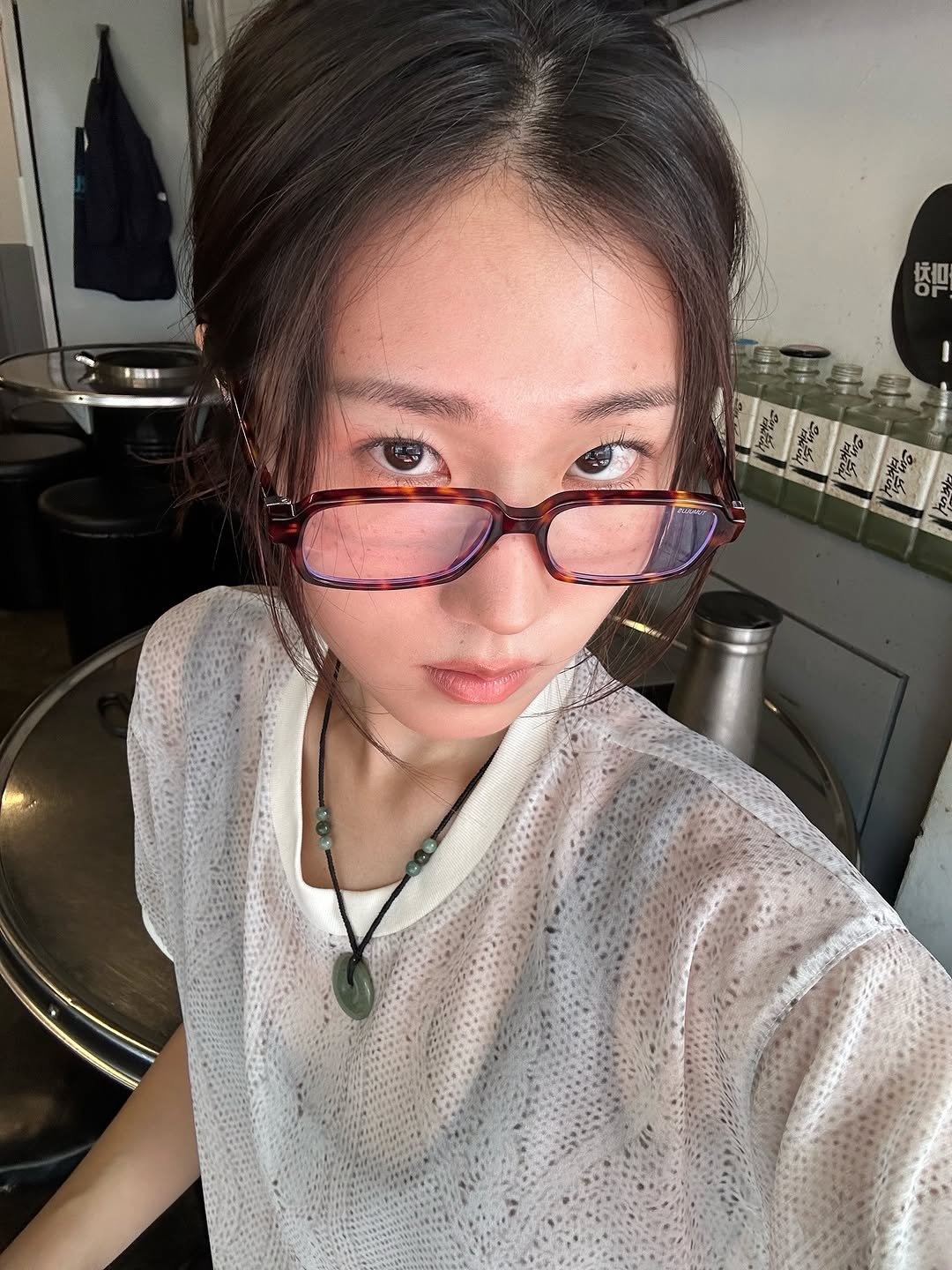 Photo shared by 소연 Soyeon on July 24, 2025 tagging @tumulus.official, and @tiles.house. May be a selfie of 1 person, hair, eyeglasses and text.
