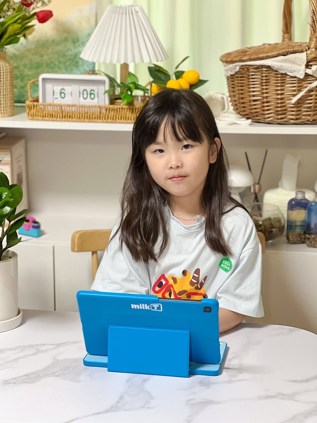 Photo shared by 득템이맘 😁서가람 on August 30, 2025 tagging @milkt_official. May be an image of 1 person, child, toy and text that says '6106 _6 06 milk milkT 7'.
