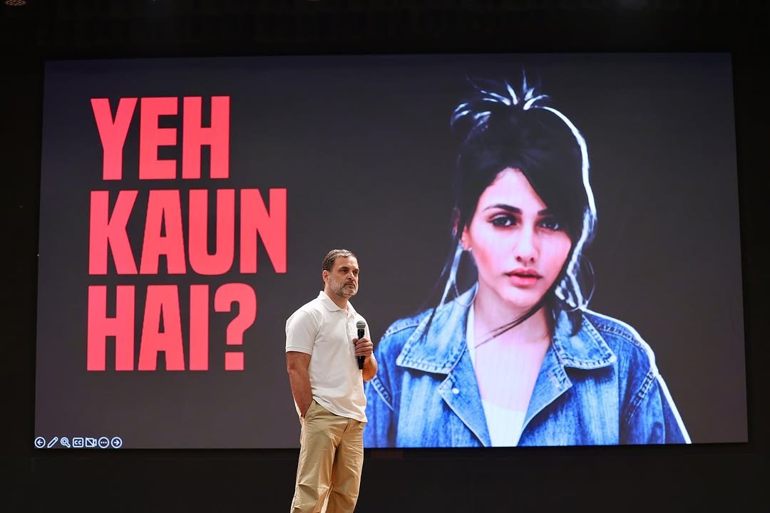 Photo shared by Rahul Gandhi on November 05, 2025 tagging @incindia. May be an image of one or more people, people standing, screen and poster.