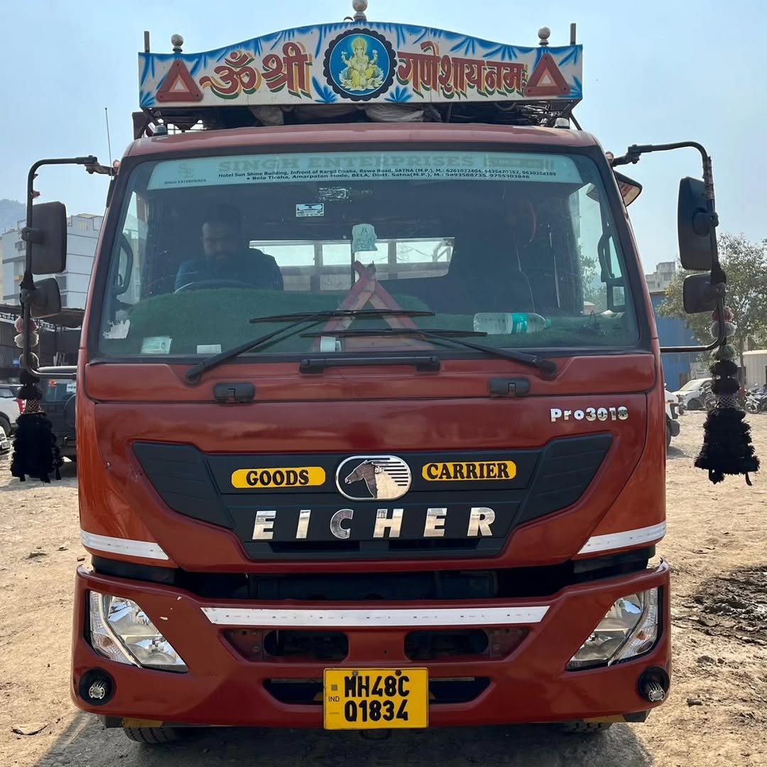 Photo by RAJ MOTORS, मुंबई on December 03, 2025. May be an image of truck, bus, outdoors and text that says 'ॐश गणशायनम 出 nиc aK GOODS Pro3010 CARRIER EICHER 48 IND 01834'.