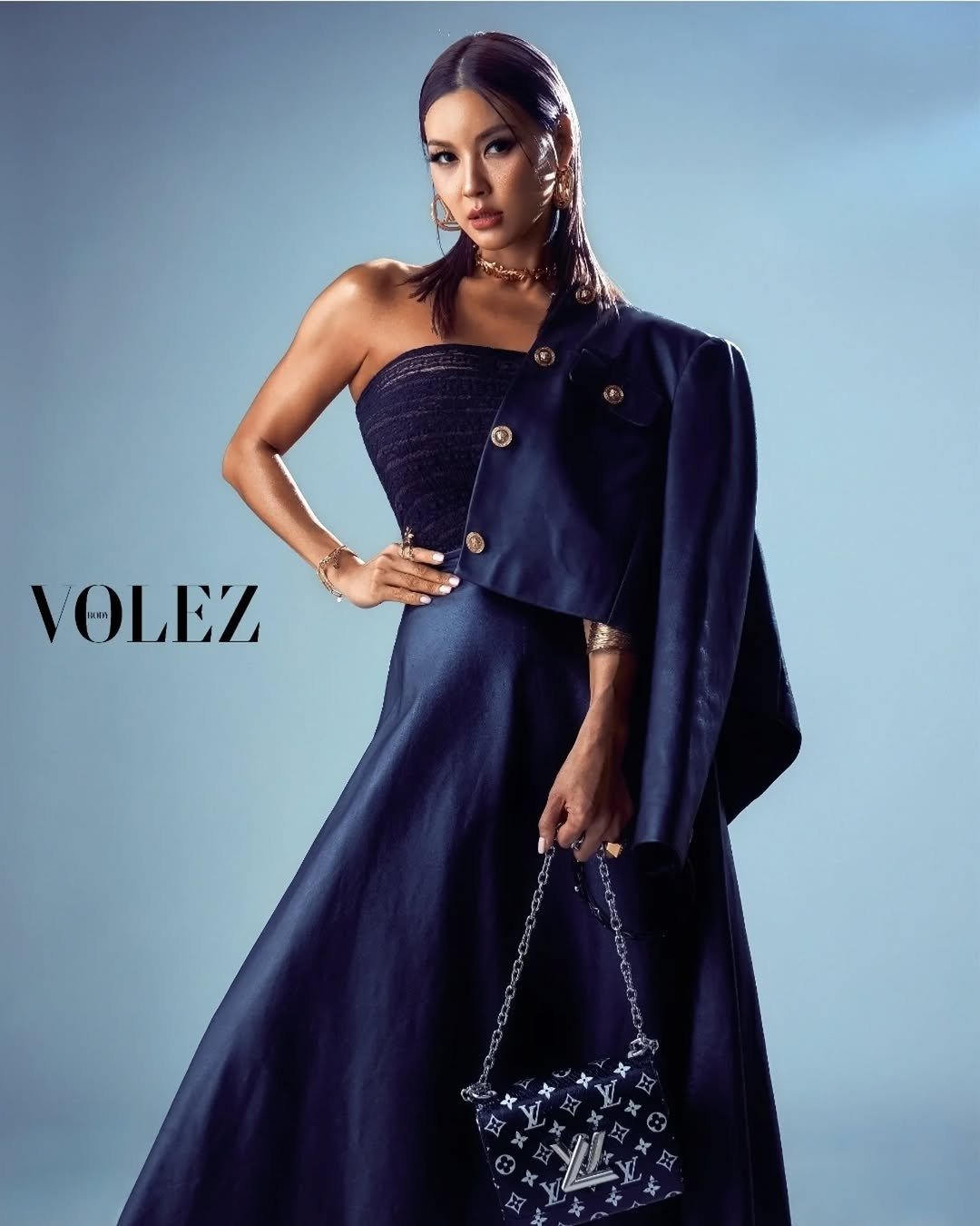 Photo shared by 이모란 on October 22, 2025 tagging @volez_studio. May be an image of one or more people, makeup, magazine, dress and text.