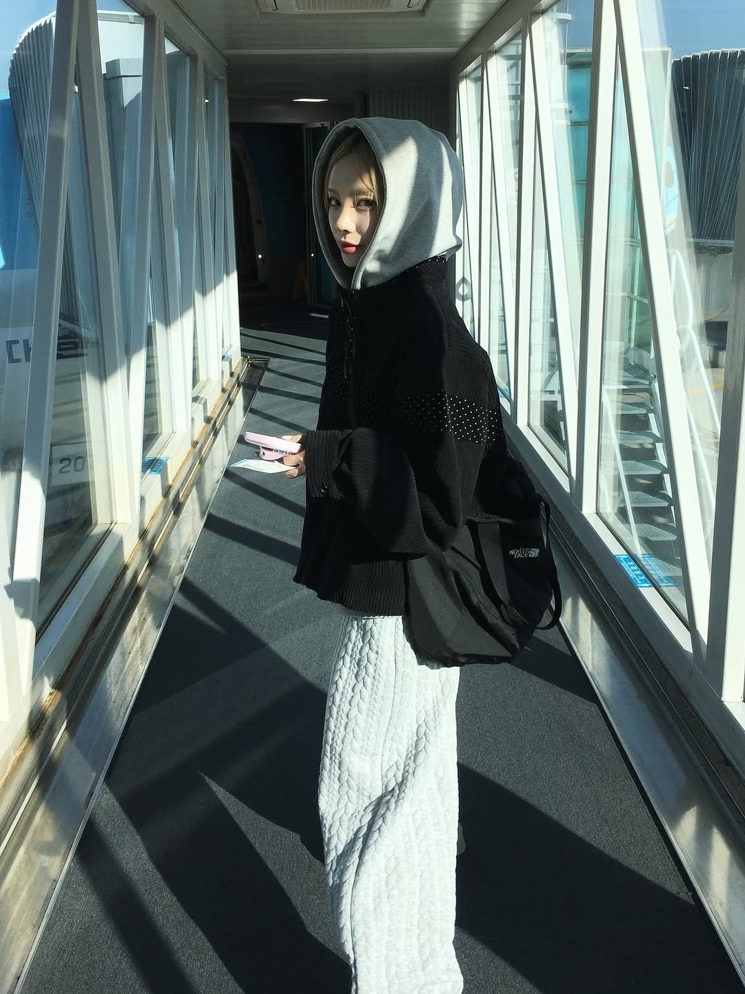 Photo by 안아란 on November 09, 2025. May be an image of cloak, terminal and text.