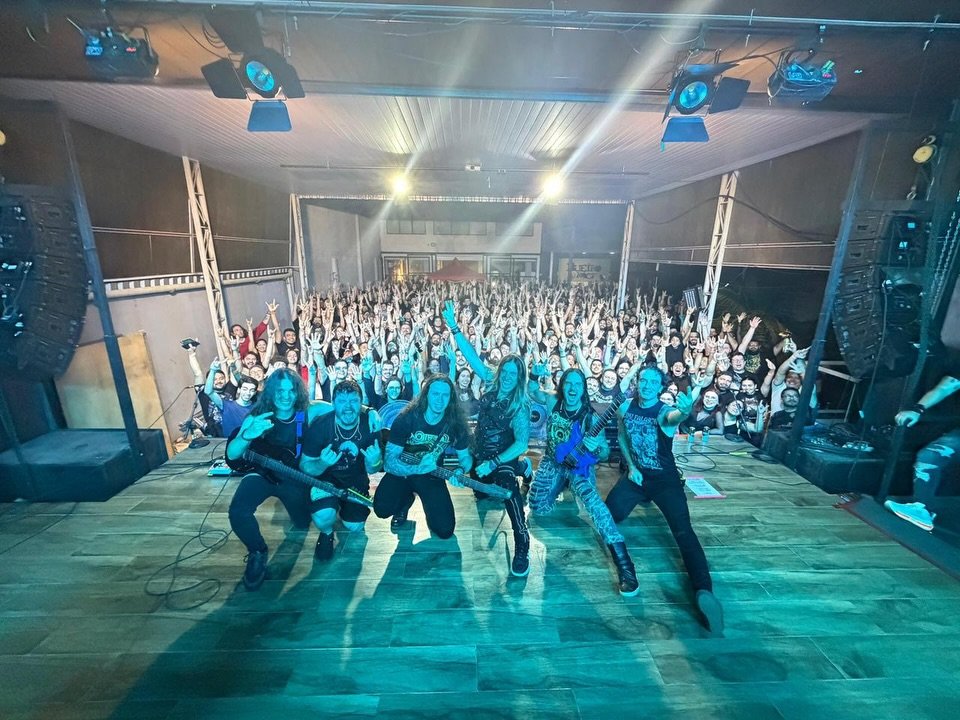 Photo by Raphael Dafras on December 15, 2025. May be an image of one or more people, crowd, concert and text.