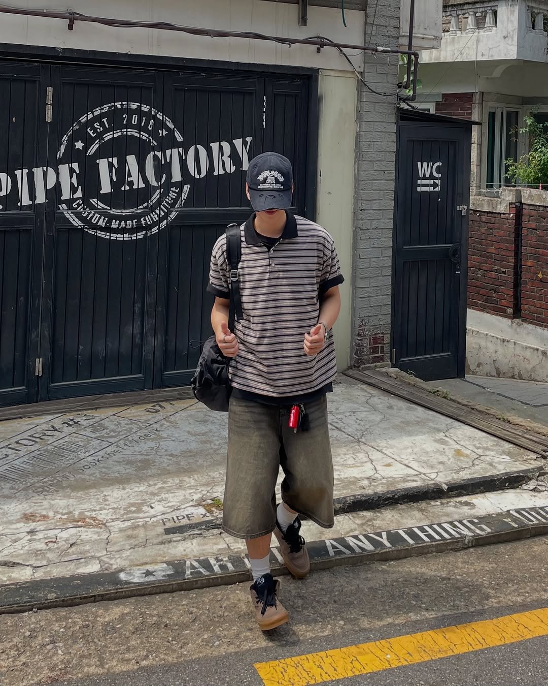 Photo shared by 데일리 패션 레슬 on August 03, 2025 tagging @recordy.slow. May be an image of 1 person, street and text.
