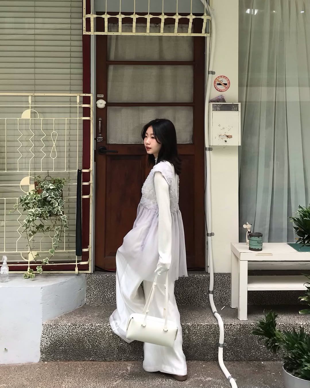 Photo shared by 𝙍𝙚𝙣𝙚𝙚 𝙏. on March 23, 2026 tagging @meierq. May be an image of wind chime, bath robe, sarong and text.