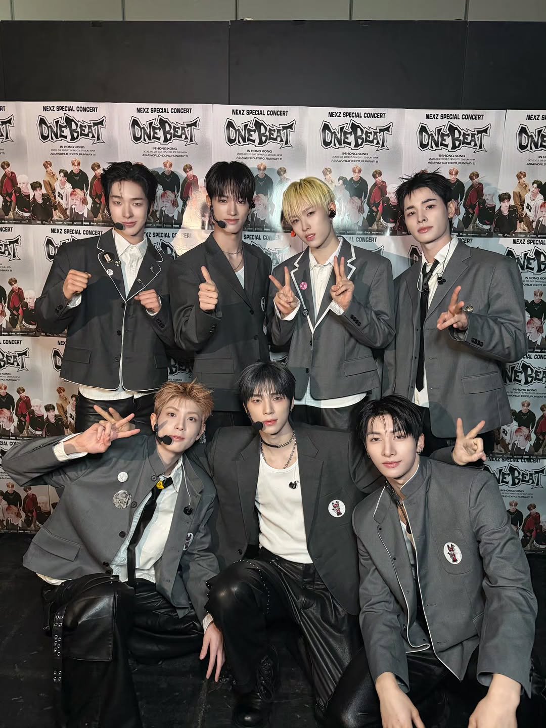 Photo by NEXZ on March 28, 2026. May be an image of one or more people, bangs, bolo tie, poster and text.