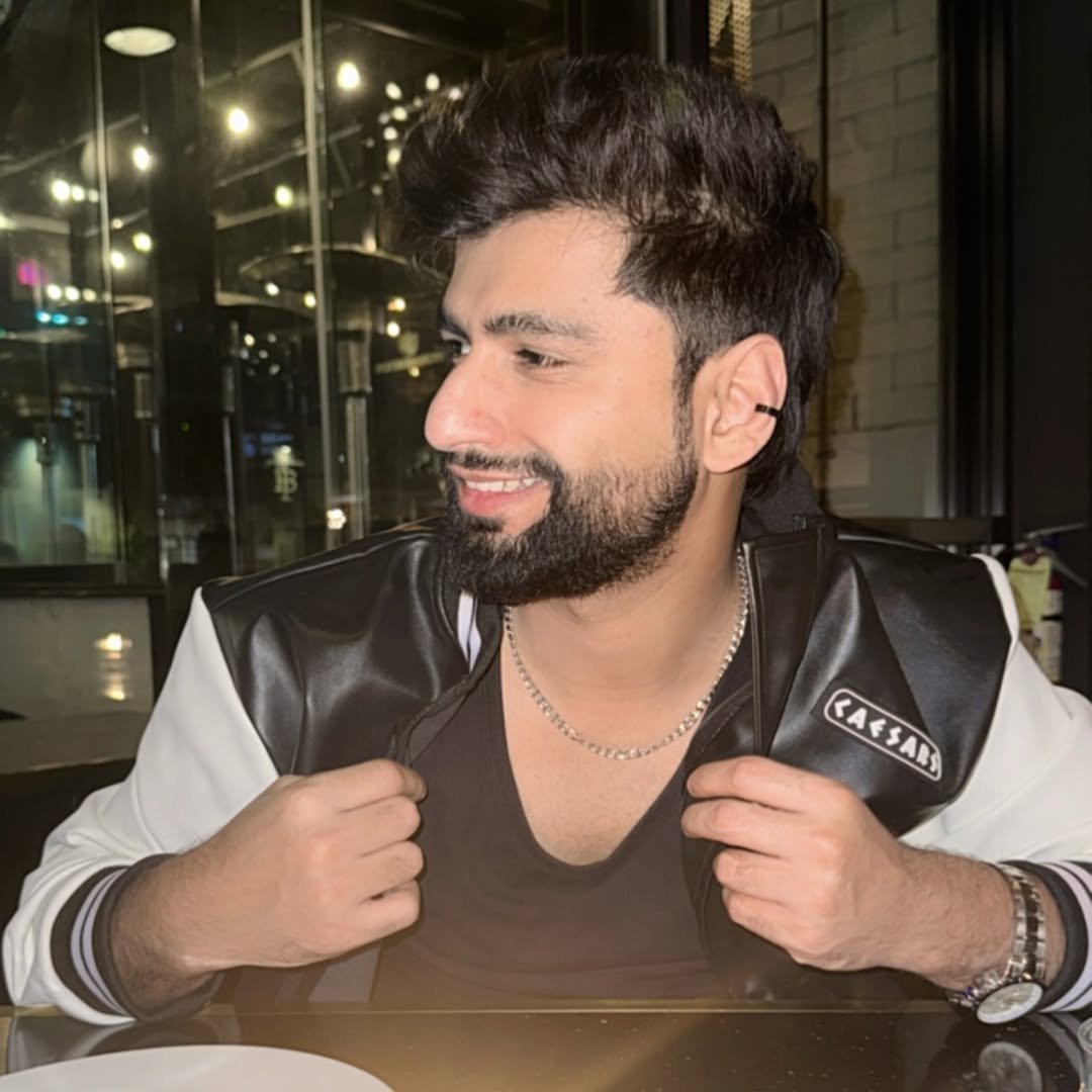 Photo by Harsh Gujral on September 04, 2025. May be a selfie of 1 person, beard, hair, smiling, jacket and text.
