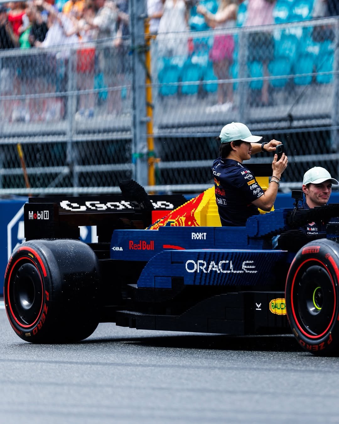 Photo shared by Oracle Red Bull Racing on April 28, 2026 tagging @maxverstappen1, and @yukitsunoda0511. May be an image of racing vehicles, race car and text.