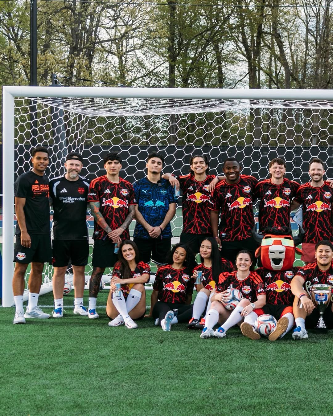 Photo shared by Red Bull New York on April 24, 2026 tagging @redbullusa. May be an image of football, soccer, sports equipment, ball, grass, stadium and text.