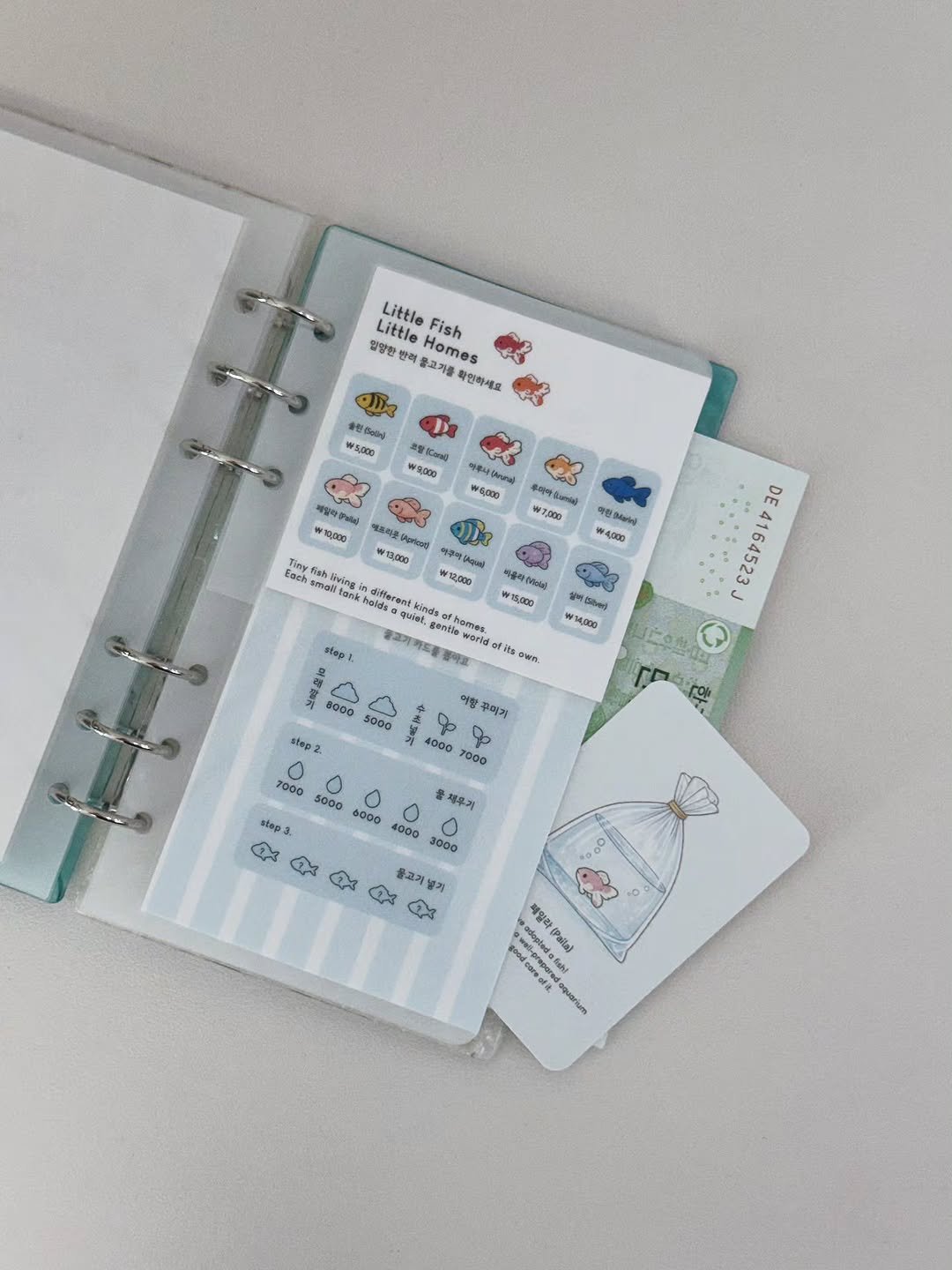 Photo by 르미 | Save slowly, grow surely 🌱 on March 27, 2026. May be an image of diary, binder, clipboard, calendar and text.