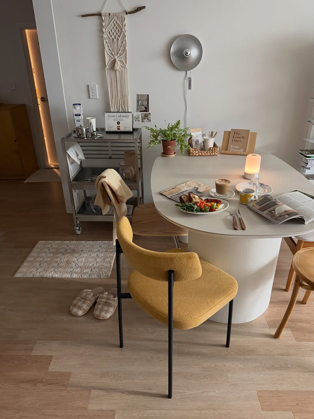 Photo by 른 른 ♡ on December 11, 2025. May be an image of table, macrame, dining table, armchair, chair, indoors and text.