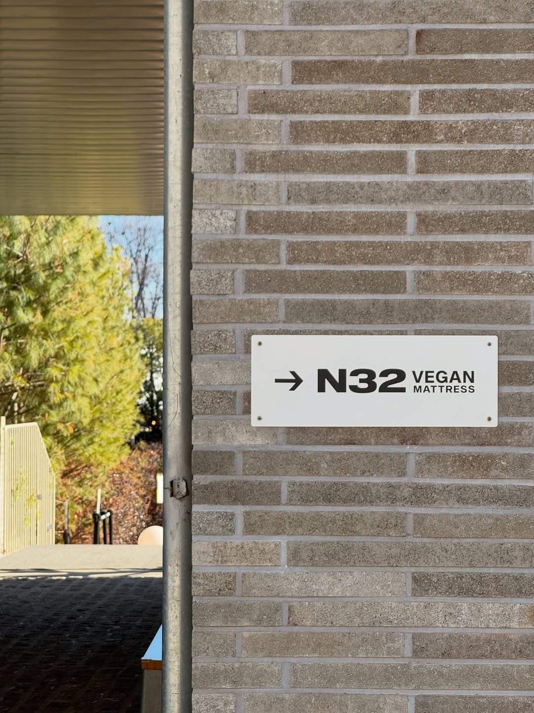 Photo shared by Sun Hyerim on January 03, 2026 tagging @n32official. May be an image of brick wall and text that says '→ N32 N32MEGAN MATTRESS VEGAN'.