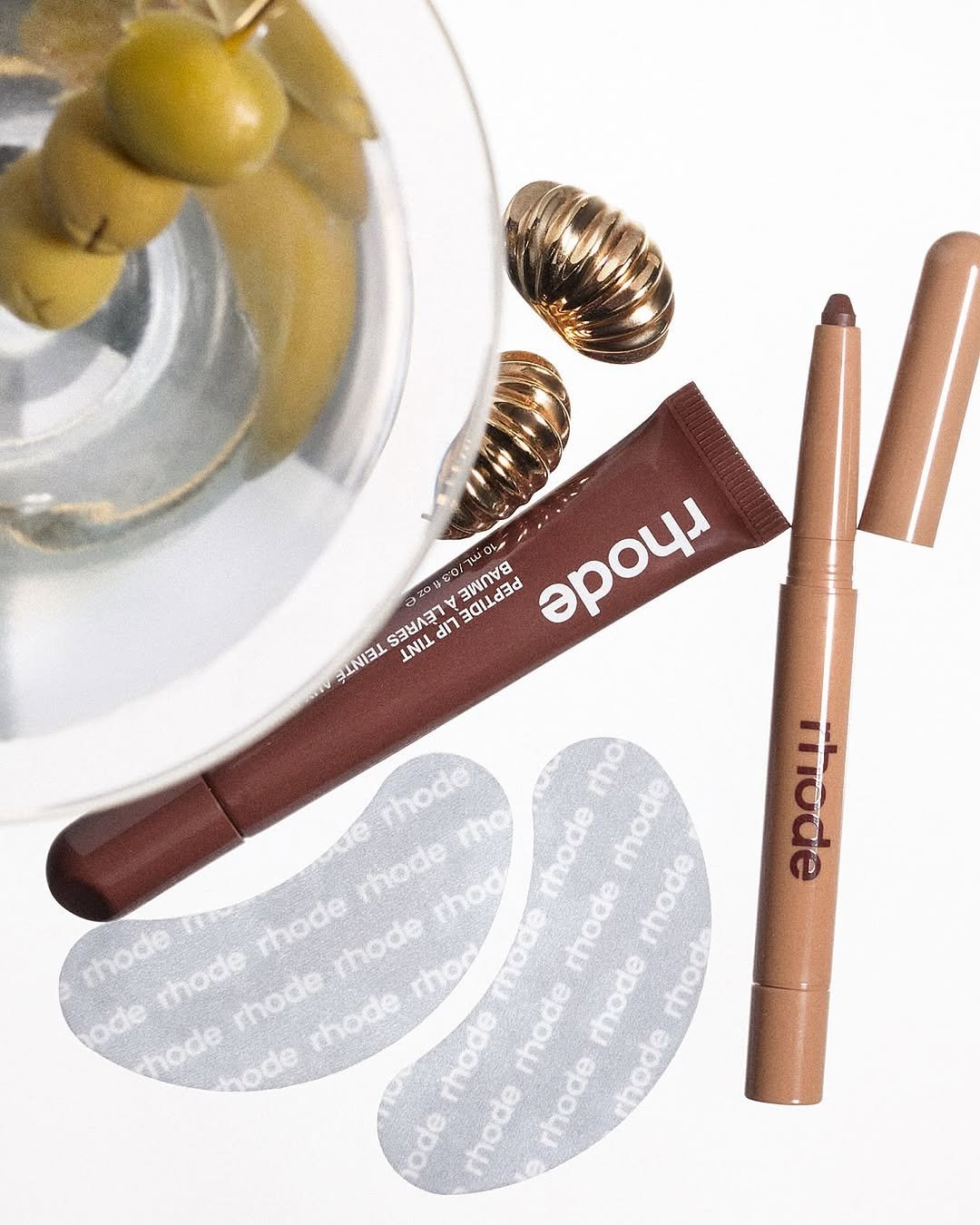 Photo by rhode skin on October 14, 2025. May be an image of one or more people, makeup, lipstick, corkscrew, cosmetics, hand cream and text that says 'tue muio মক 心語 80 O1 BANEE PEREPER 3po4и Tnad RERS ለ3ገ dii FIEFITT TTTT hode rho node thod hode rhode 0 rhode thode thoo noce mhode mhode rhode thode.rho thode rhode ode hode hode moce rhode Thode thode rhode rhode ode rhode mhode mbode'.