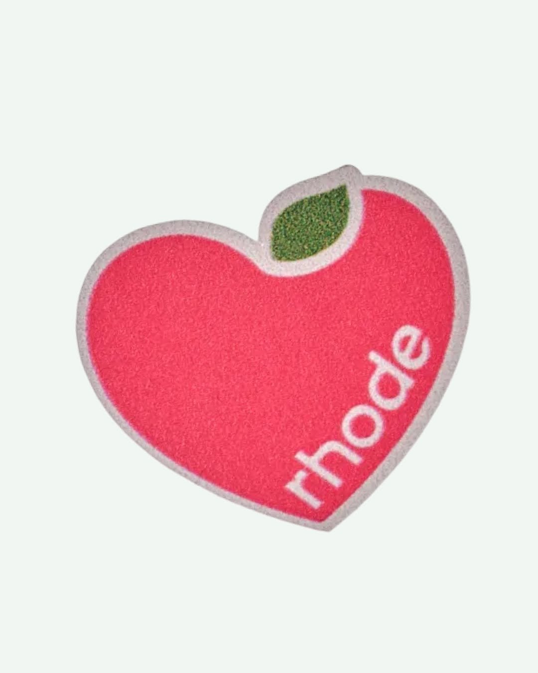 Photo by rhode skin on March 02, 2026. May be an image of apple, heart and text.