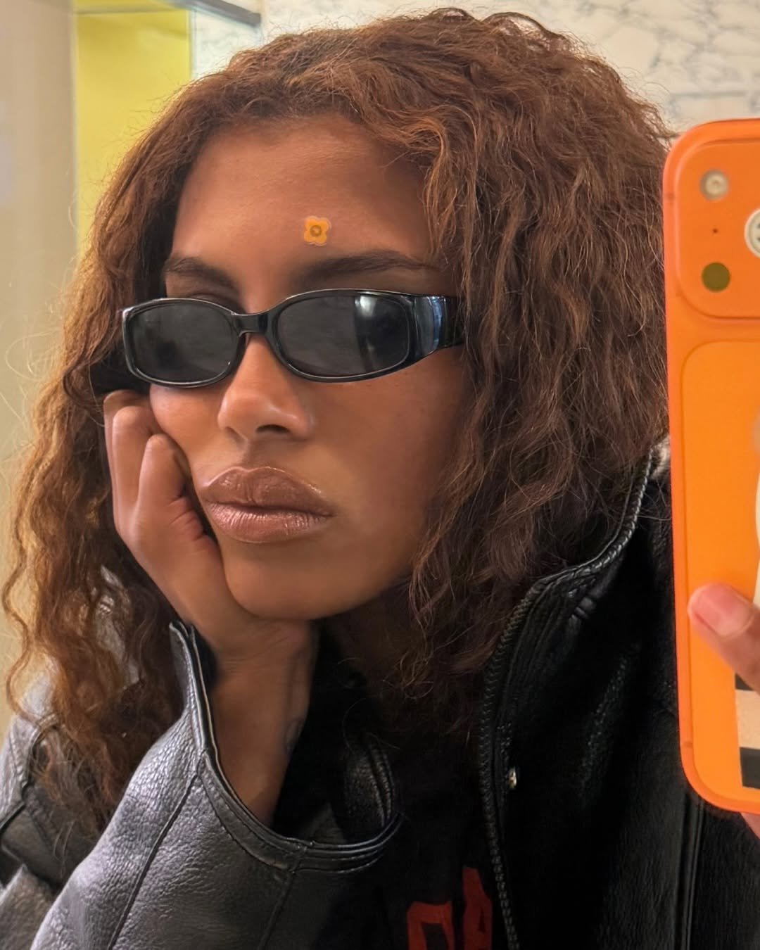 Photo shared by rhode skin on April 16, 2026 tagging @mv.tiangue. May be a selfie of one or more people, makeup, sunglasses, glasses and text.