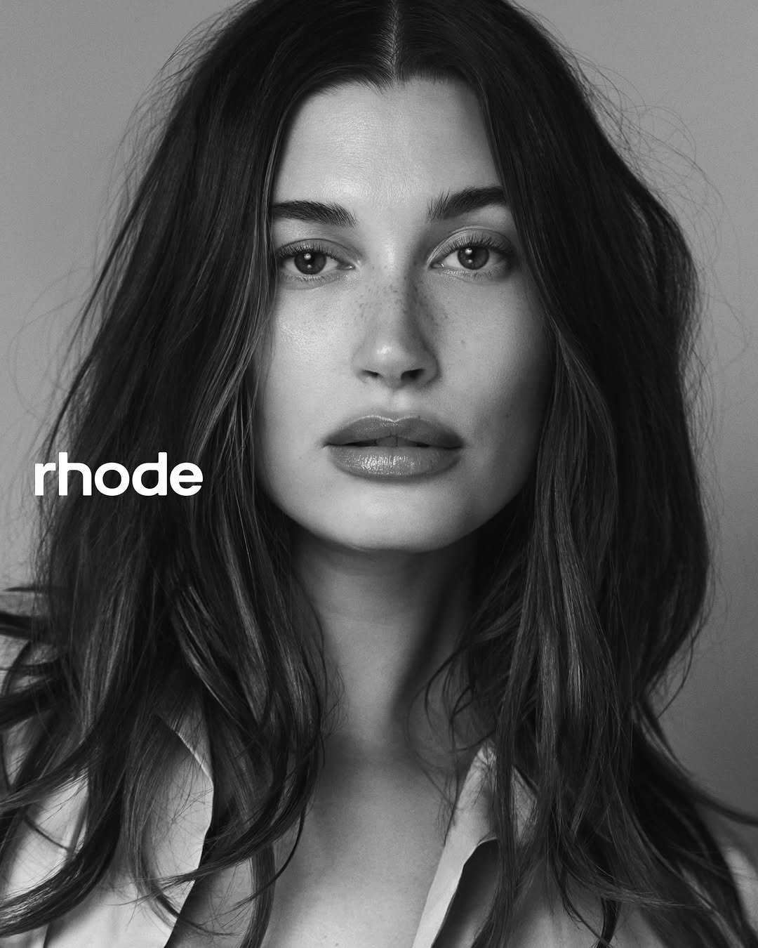 Photo shared by rhode skin on January 08, 2026 tagging @meccabeauty. May be a black-and-white image of one or more people, hair, makeup and text that says 'rhode'.