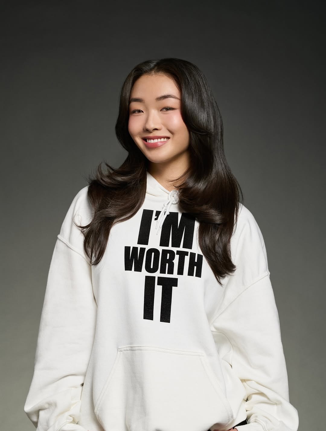 Photo by richelle z on March 13, 2026. May be an image of fleece, parka, sweatshirt and text that says 'I'M WORTH T'.