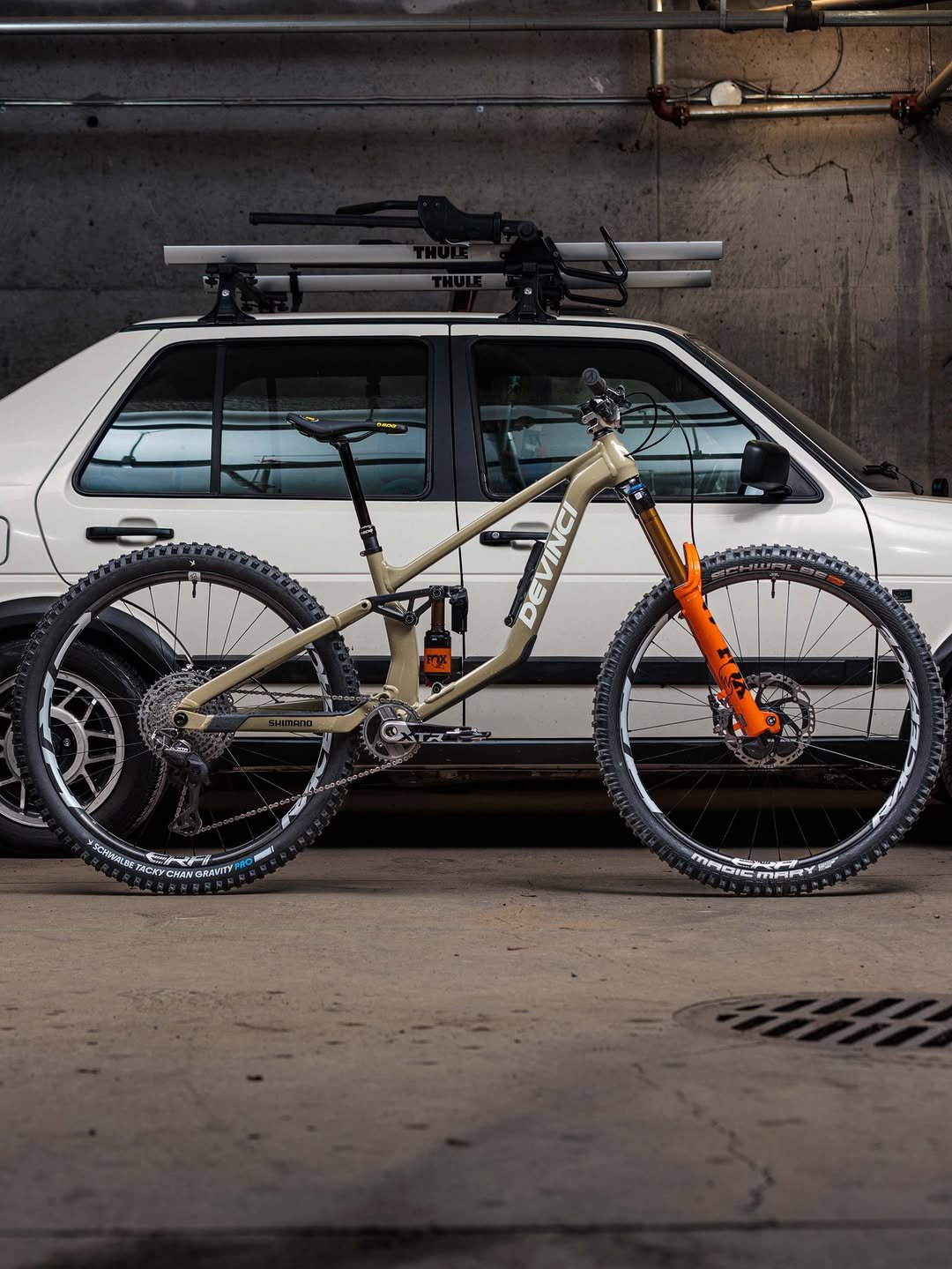 Photo shared by Cycles Devinci on April 23, 2026 tagging @raceface, @sdgcomponents, @elly.hoskin, @shimanomtb, and @ridefoxbike. May be an image of bicycle, rack and text.