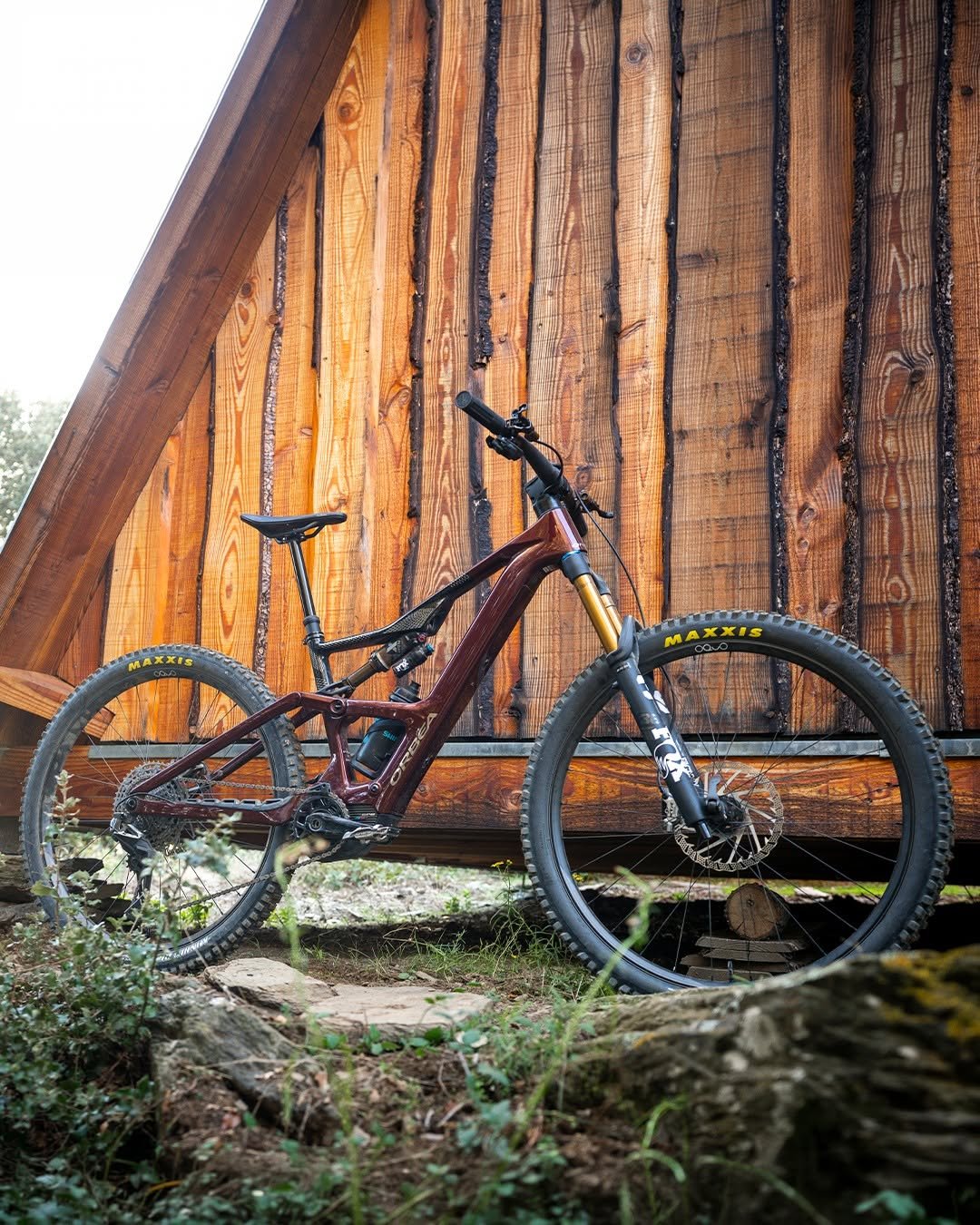Photo shared by Orbea MTB on February 18, 2026 tagging @shimanomtb, @ridefoxbike, and @trailtales_. May be an image of bicycle, covered bridge and text.