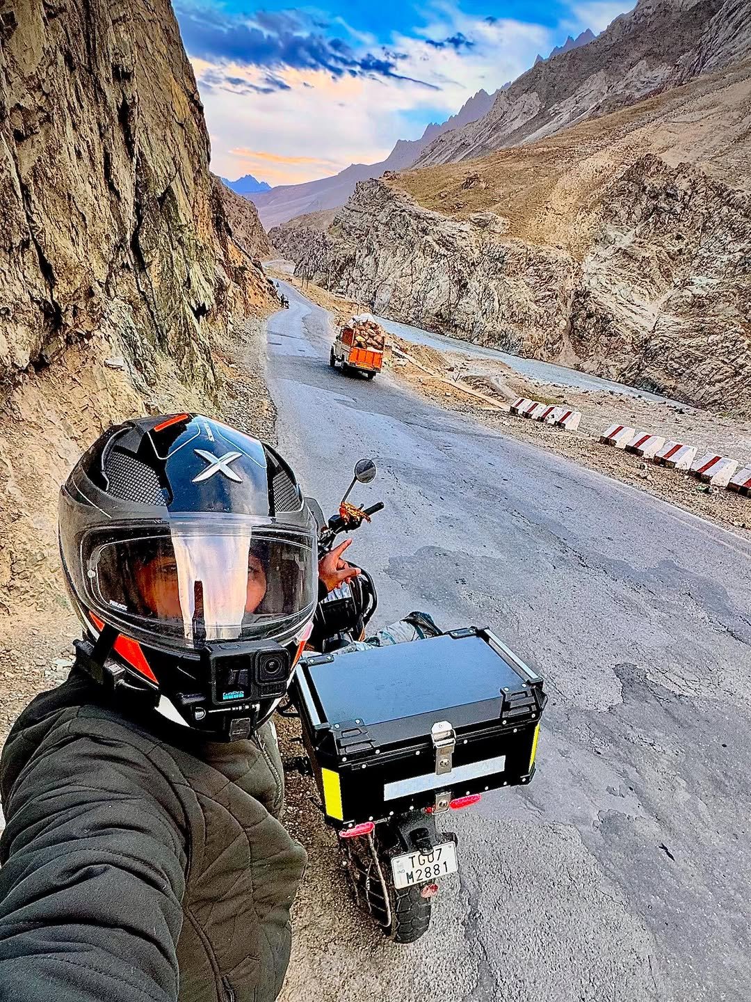 Photo by Rider on November 21, 2025. May be an image of motorcycle, helmet, scooter, road and text.