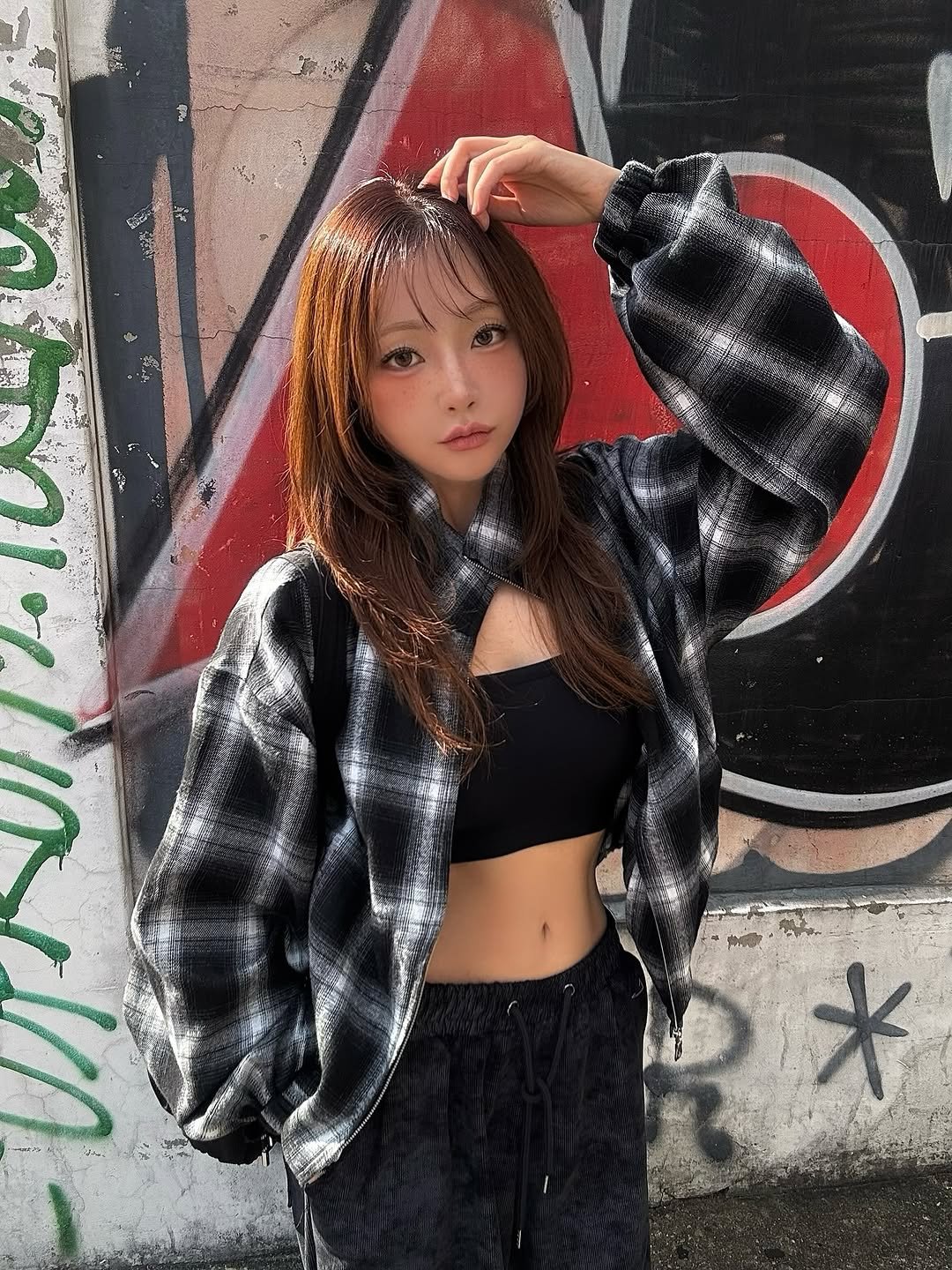 Photo shared by 𝘾𝙝𝙚𝙧𝙧𝙮🍒 on October 26, 2025 tagging @idws_official. May be an image of one or more people, hair, jacket, top, flannel and text.