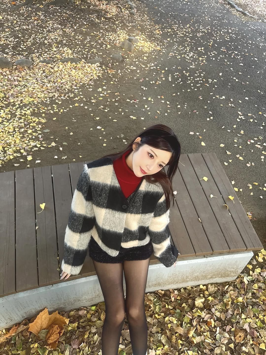 Photo by 七ツ森りり on November 22, 2025. May be an image of duffle coat, turtleneck, sweater and text.