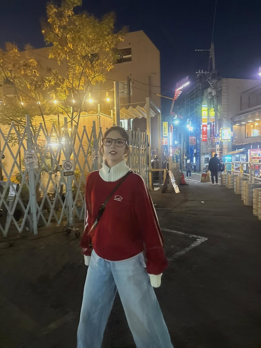 Photo by 七ツ森りり on December 15, 2025. May be an image of turtleneck, street, night and text.