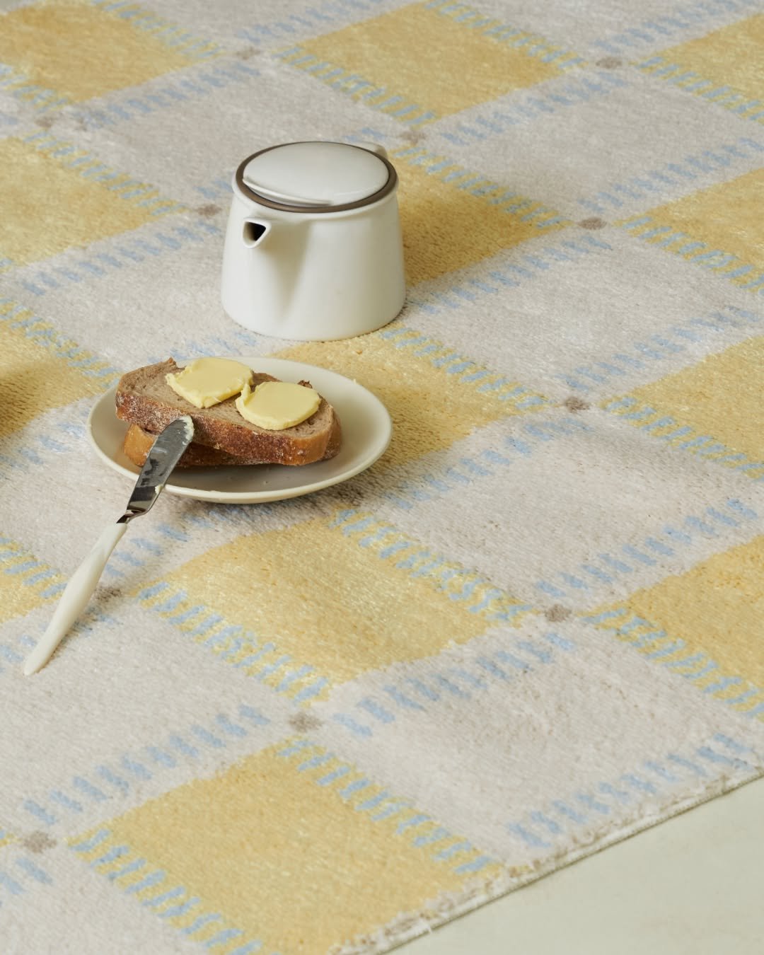 Photo by RITTEN 리튼 on October 27, 2025. May be an image of placemat, carpet, tablecloth, napkin, bathmat and text.