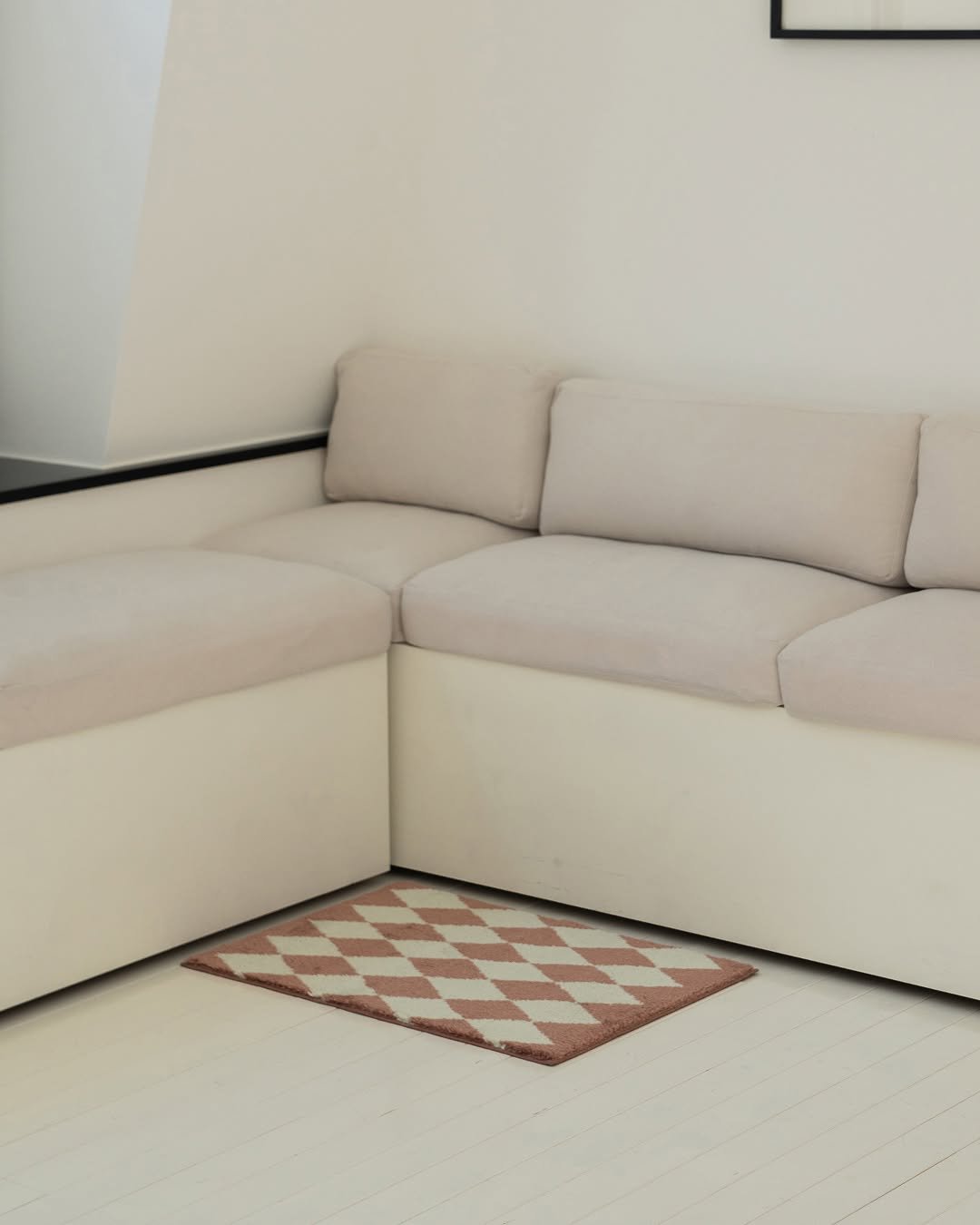 Photo by RITTEN 리튼 on September 10, 2025. May be an image of sofa, carpet, chaise lounge, futon, armchair, living room, indoors and text.