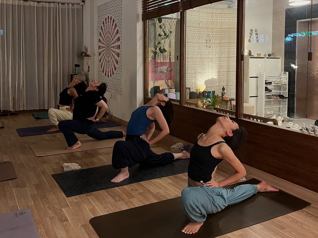 Photo by 려경 요가 on August 11, 2025. May be an image of 3 people, people practicing yoga and text.